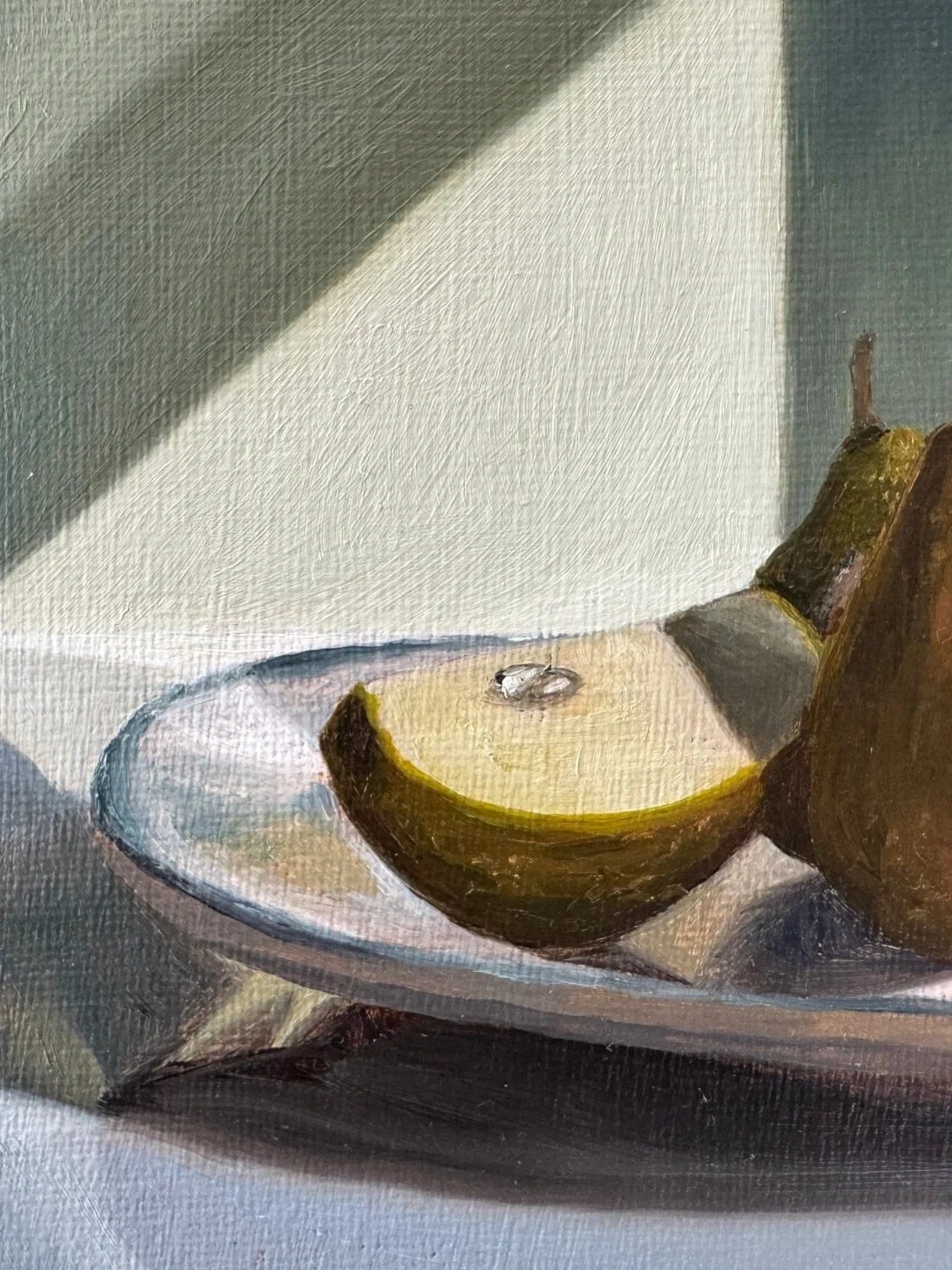 Close up of still life oil painting of pears showing brushwork and texture