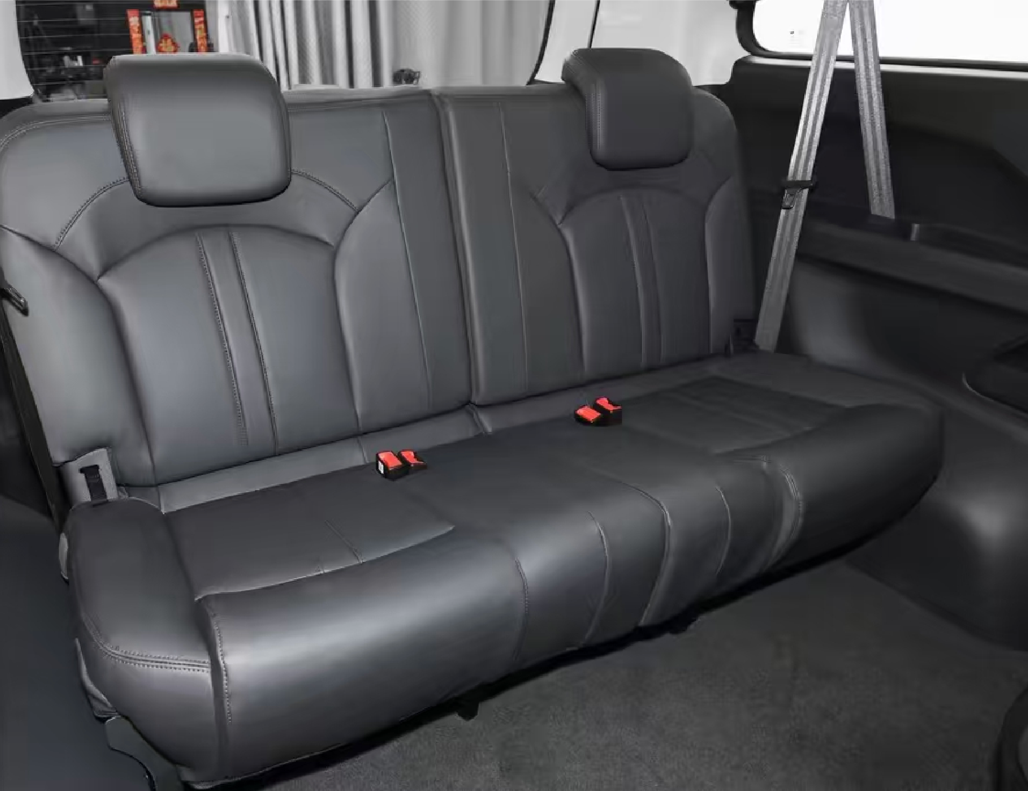 One-way airport pick-up/drop-off fee for a 9-seat vehicle.png