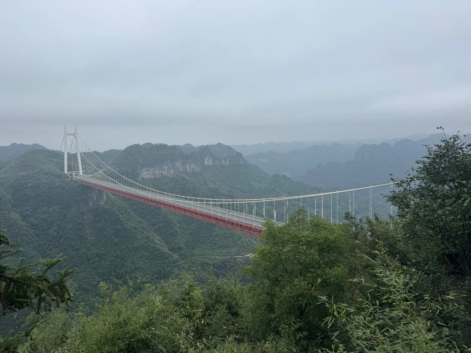 Aizhai Bridge spanning the misty Dehang Canyon in Xiangxi, Hunan