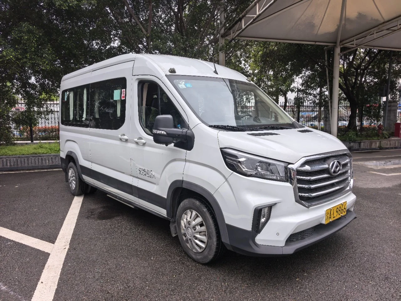 One-way airport pick-up/drop-off fee for a 15-seat vehicle.jpg