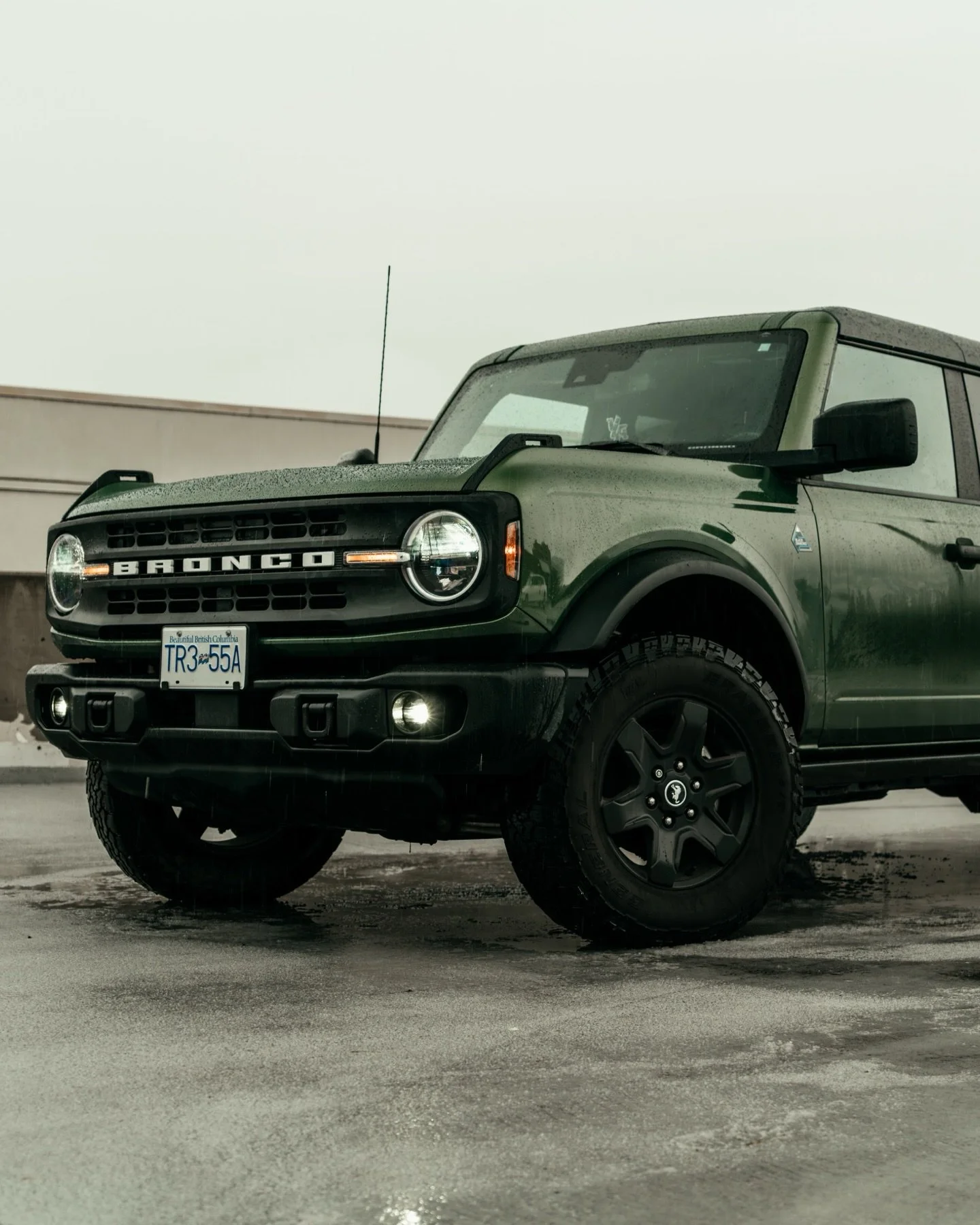 Santa brought him a green bronco for Christmas