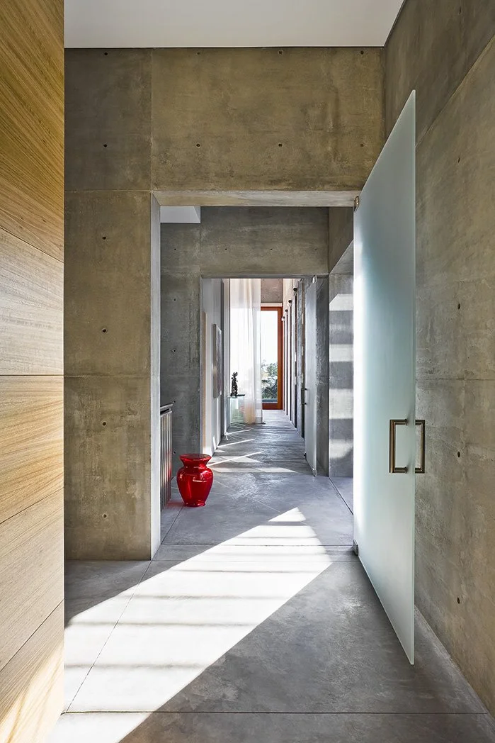  toro-canyon-house-montecito-california-concrete-hallway.jpg