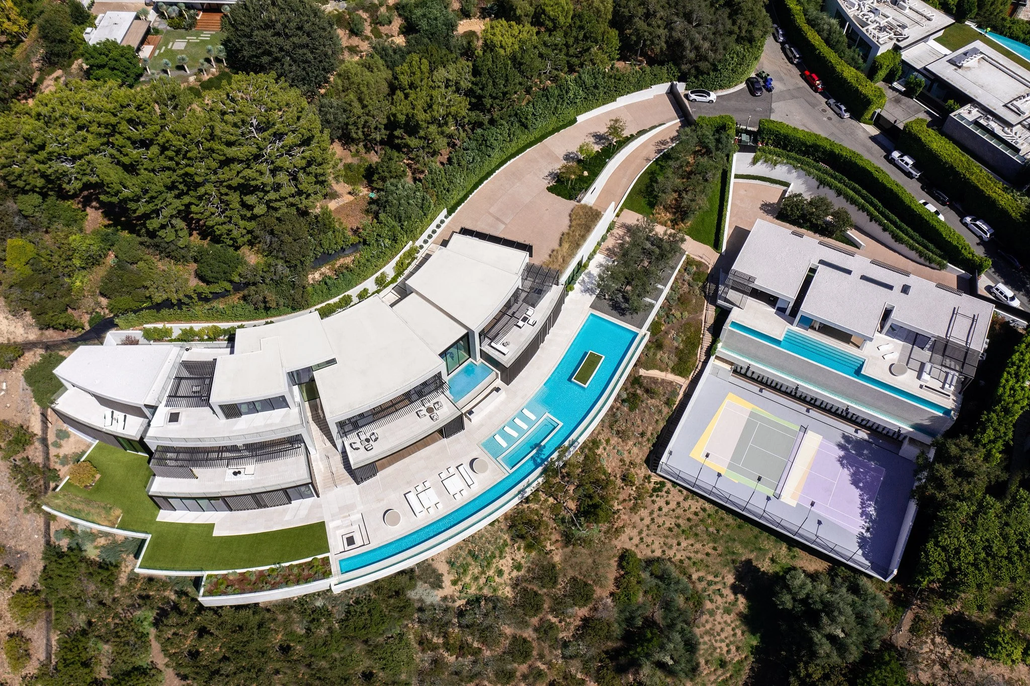 tione-estate-los-angeles-aerial-hillside-residence-pools.jpg
