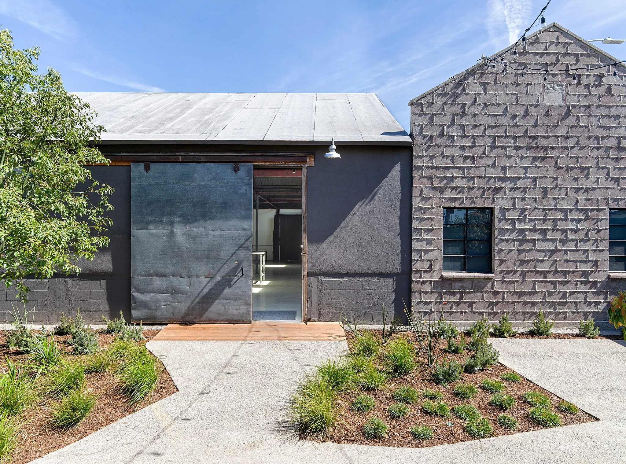 mash-studios-los-angeles-restored-industrial-building-garden.jpg