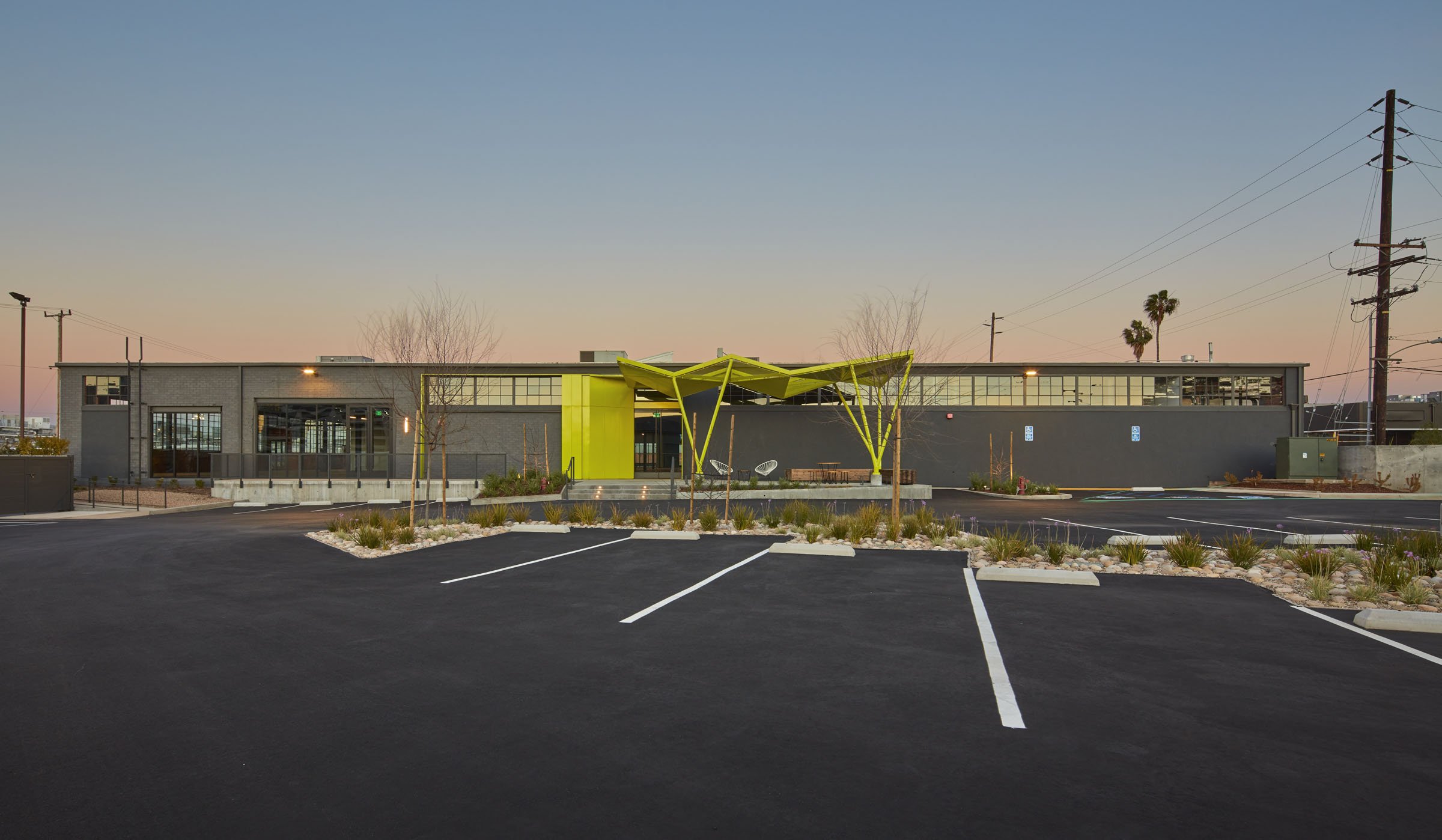 maple-el-segundo-yellow-entry-canopy-dusk.jpg