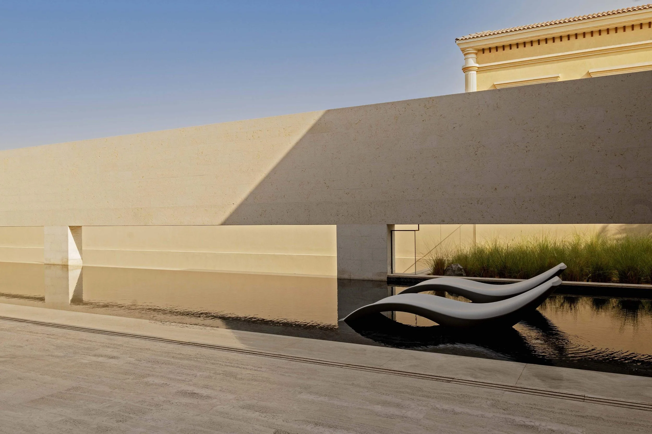 donaldson-partners-dune-house-reflecting-pool-limestone-wall.jpg