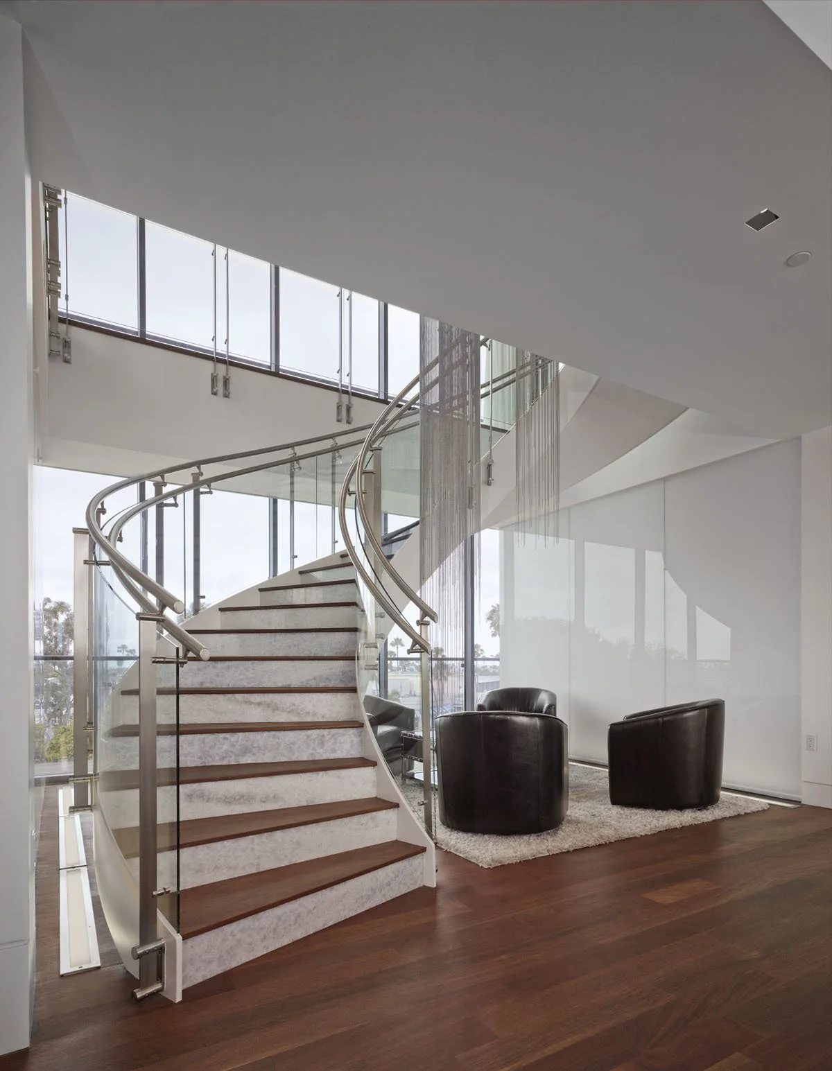 via-lido-residence-curved-stair-lounge.jpg