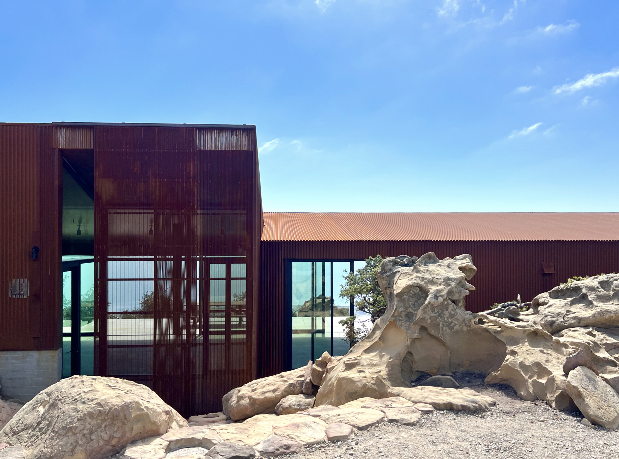 donaldson-partners-hr43-residence-hollister-ranch-weathering-steel-entry-pavilion-sandstone-landscape.jpg