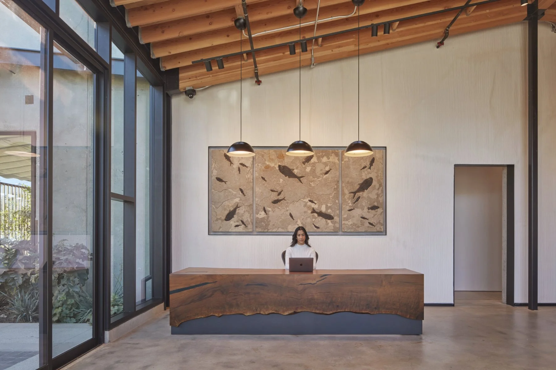 behrens-associates-el-segundo-office-reception-lobby-live-edge-desk.jpg