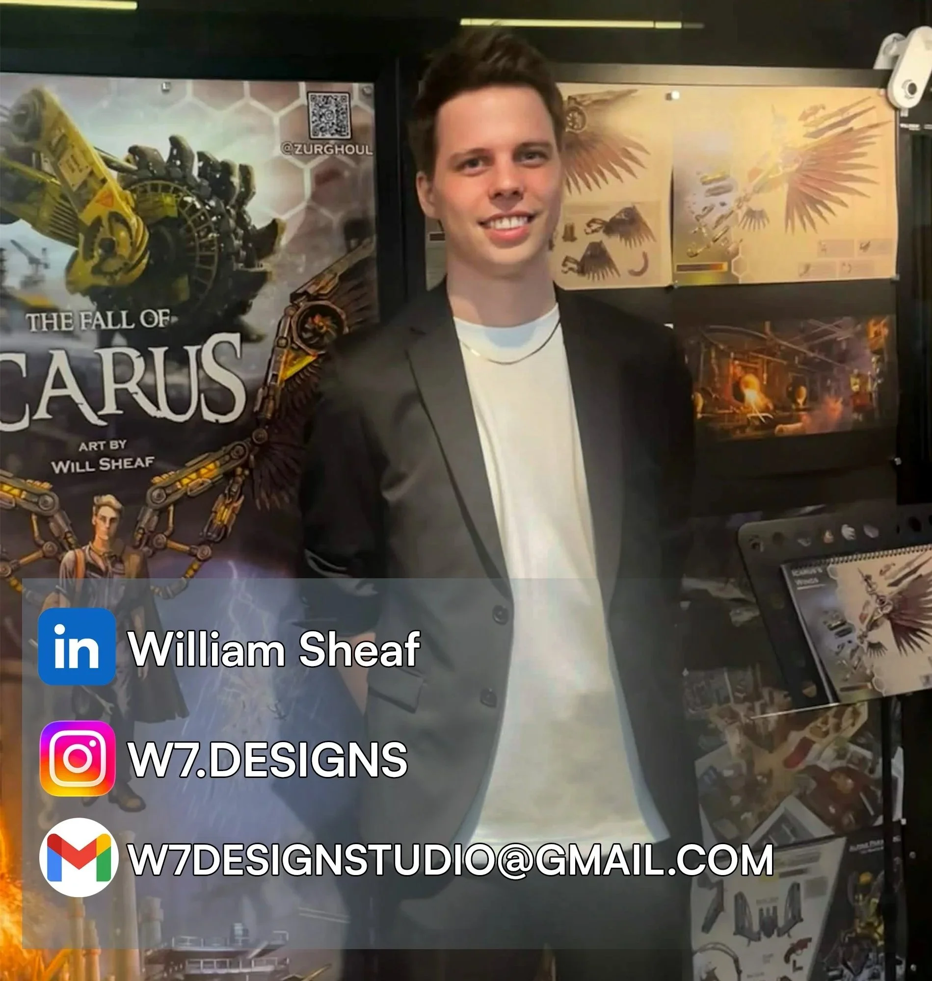 A young man in a black blazer and white t-shirt standing in front of a display board for a project titled 'The Fall of Icaerus' by Will Sheaf, with artwork and sketches behind him.