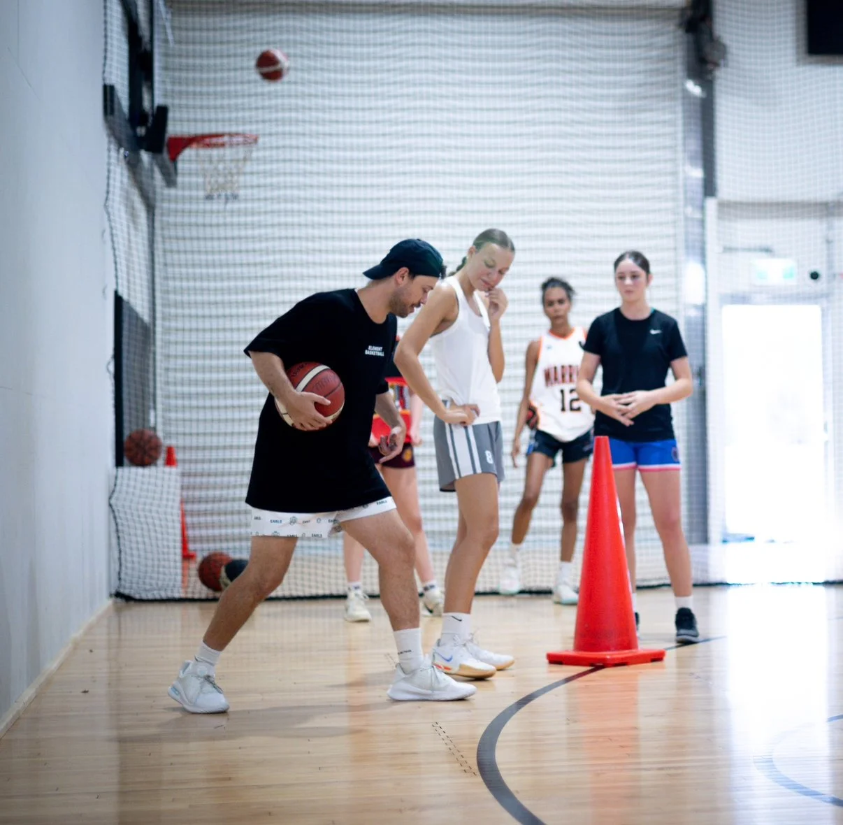 Group of women training at Element Basketball