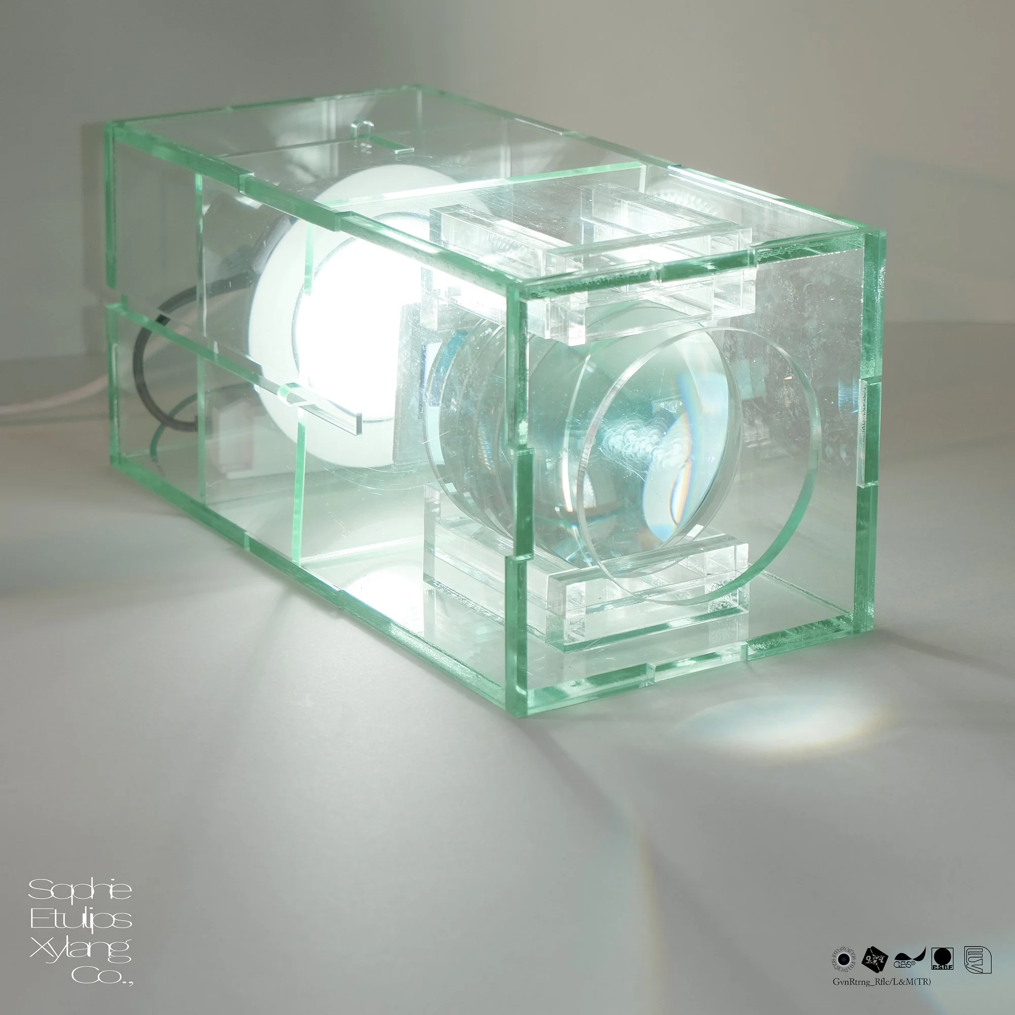 our the only media with Sophie Etulips Xylang Co., ... Light, 2021, convex lens, acrylic, slide film, 115x 115x245mm.