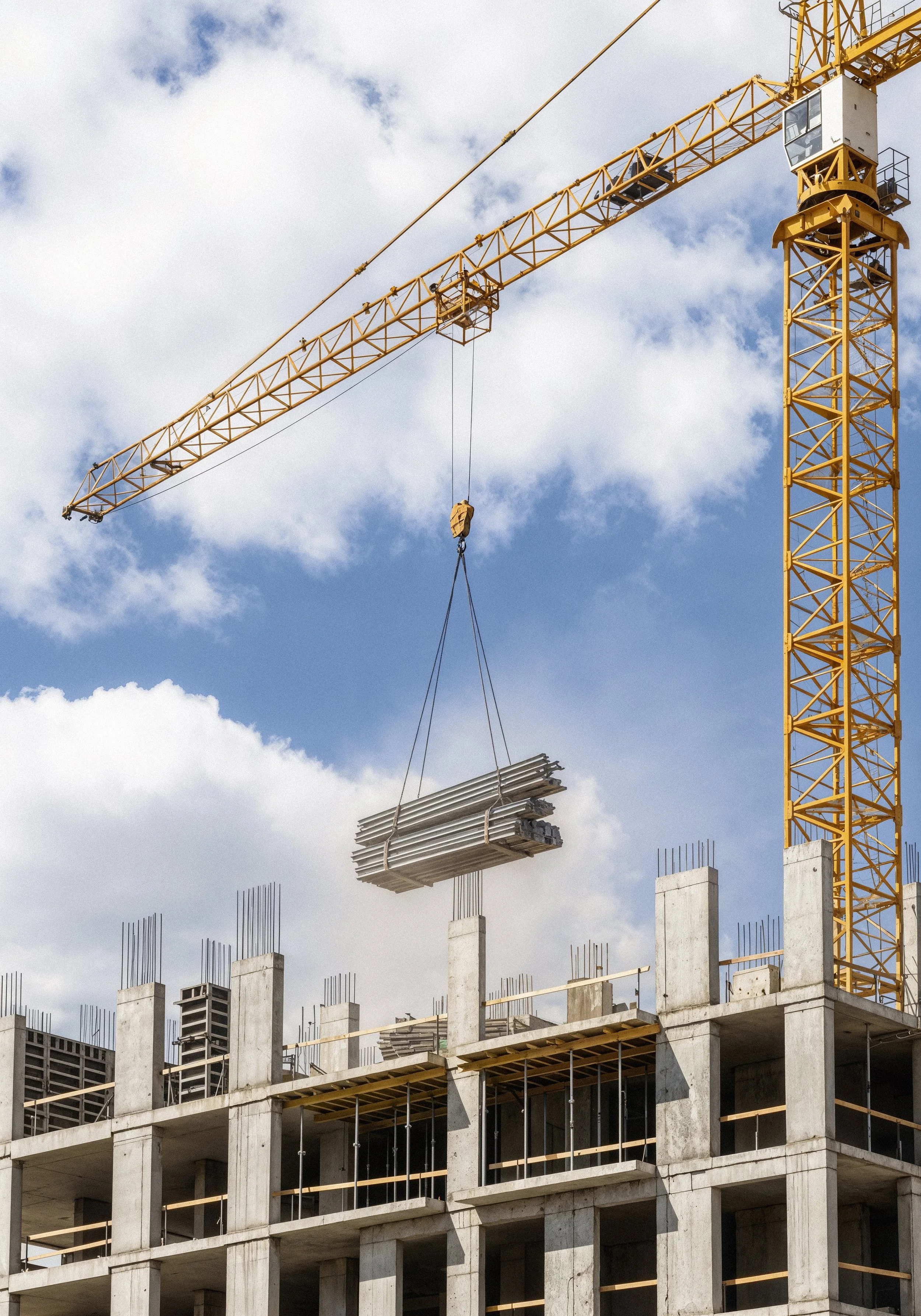 construction-crane-lifting-materials-building-site.jpg