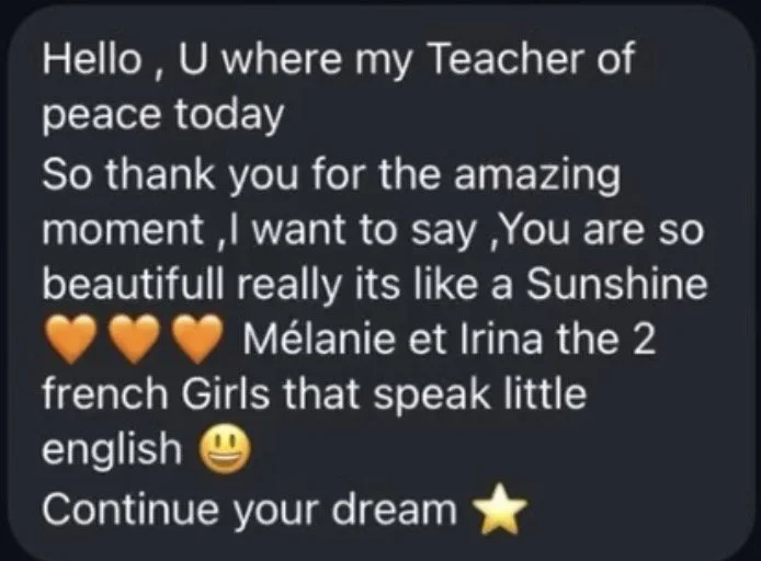 A heartfelt message expressing gratitude towards a teacher, praising their kindness and beauty, and mentioning two French girls who speak little English, signed by Melanie and Irina.
