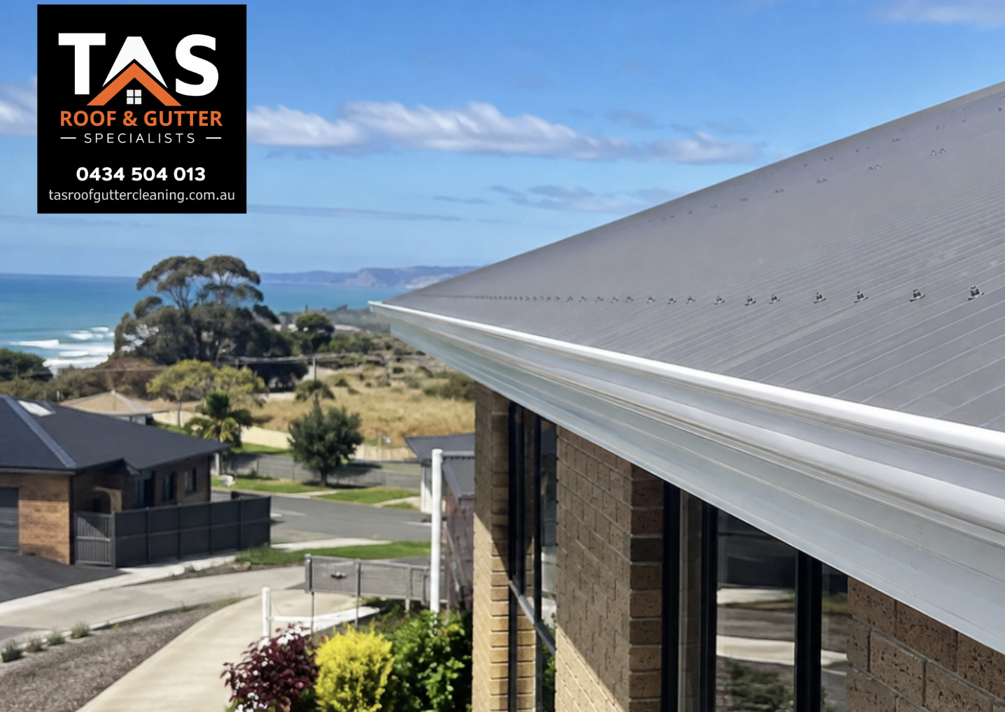 Clean gutters and roofline on a Burnie coastal home after professional gutter cleaning and maintenance