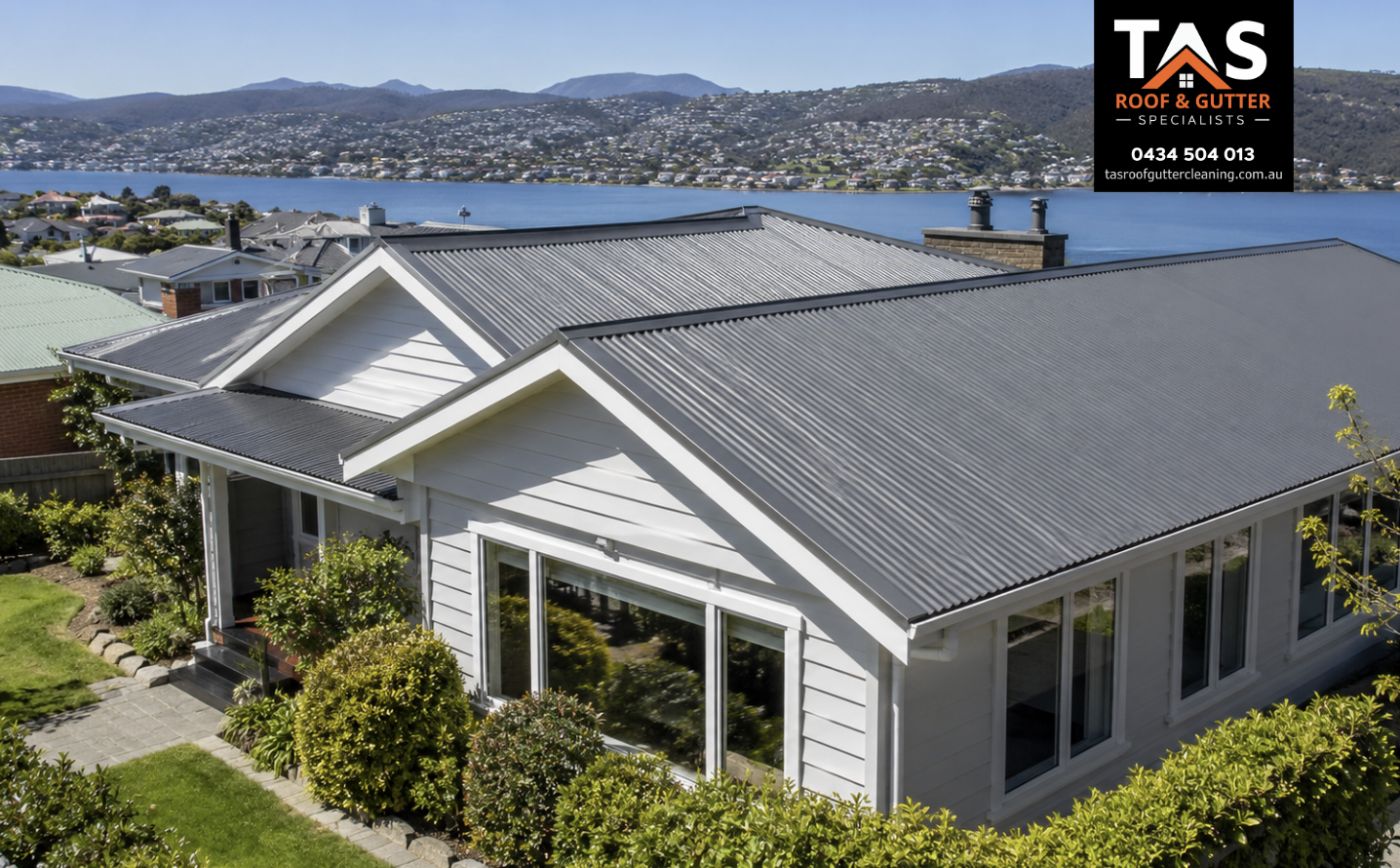 TAS Roof & Gutter Cleaning technician repairing roof edge and gutter area on a Taroona home