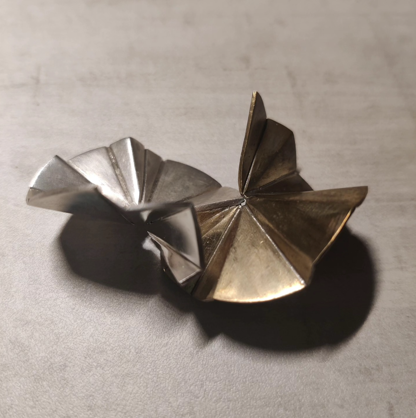   “Fold”    
Silver and brass
  