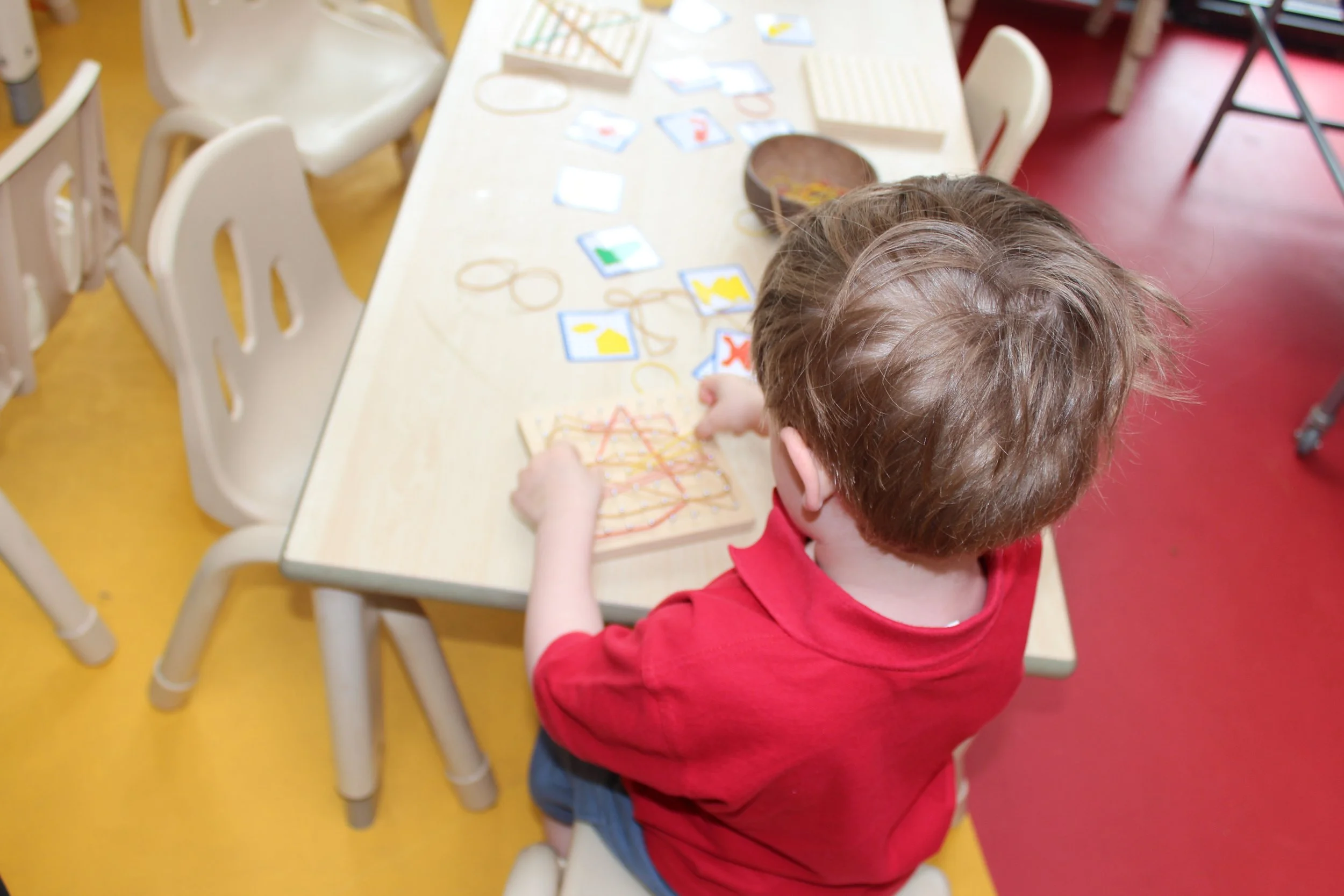 Child playing merlin (1).JPG
