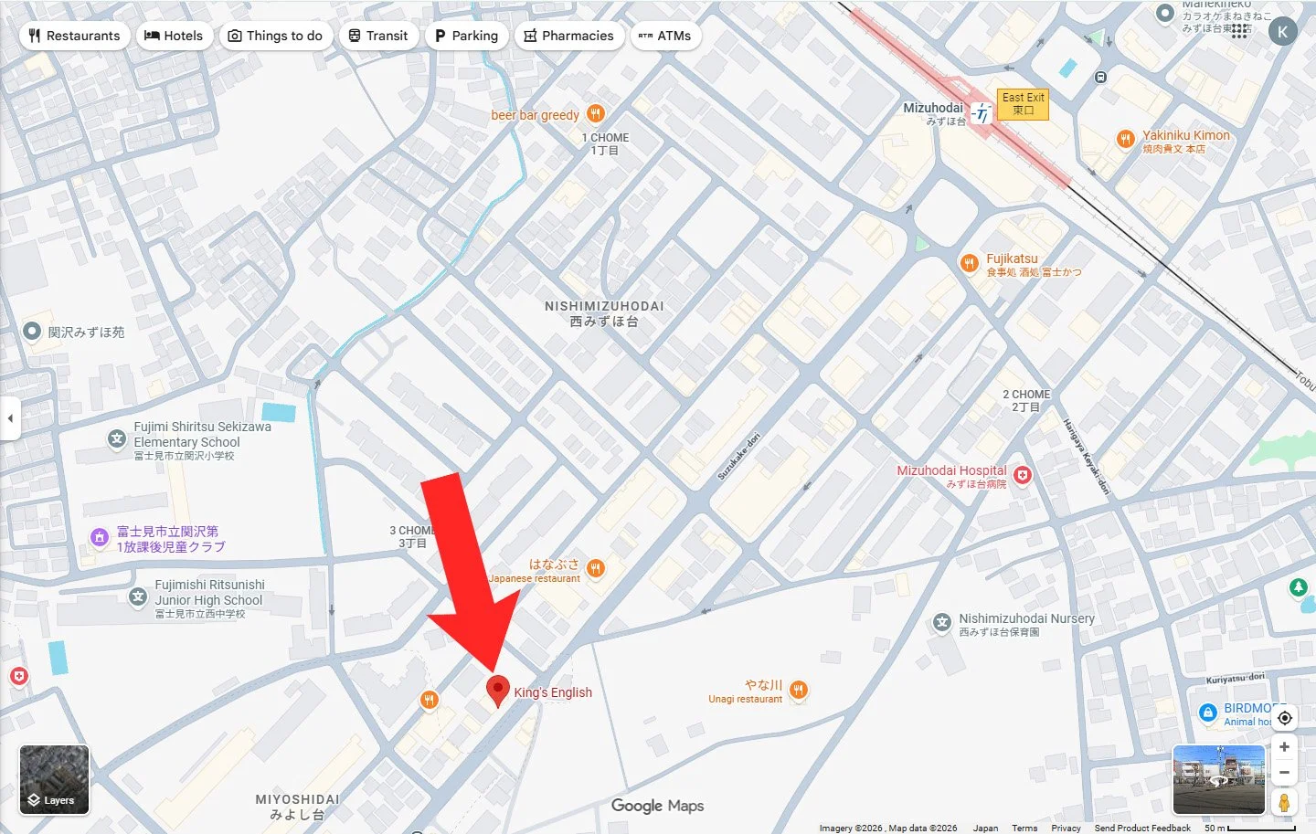 埼玉県みずほ台の地図上で、英会話スクール King’s English の場所を赤い矢印で示した案内図