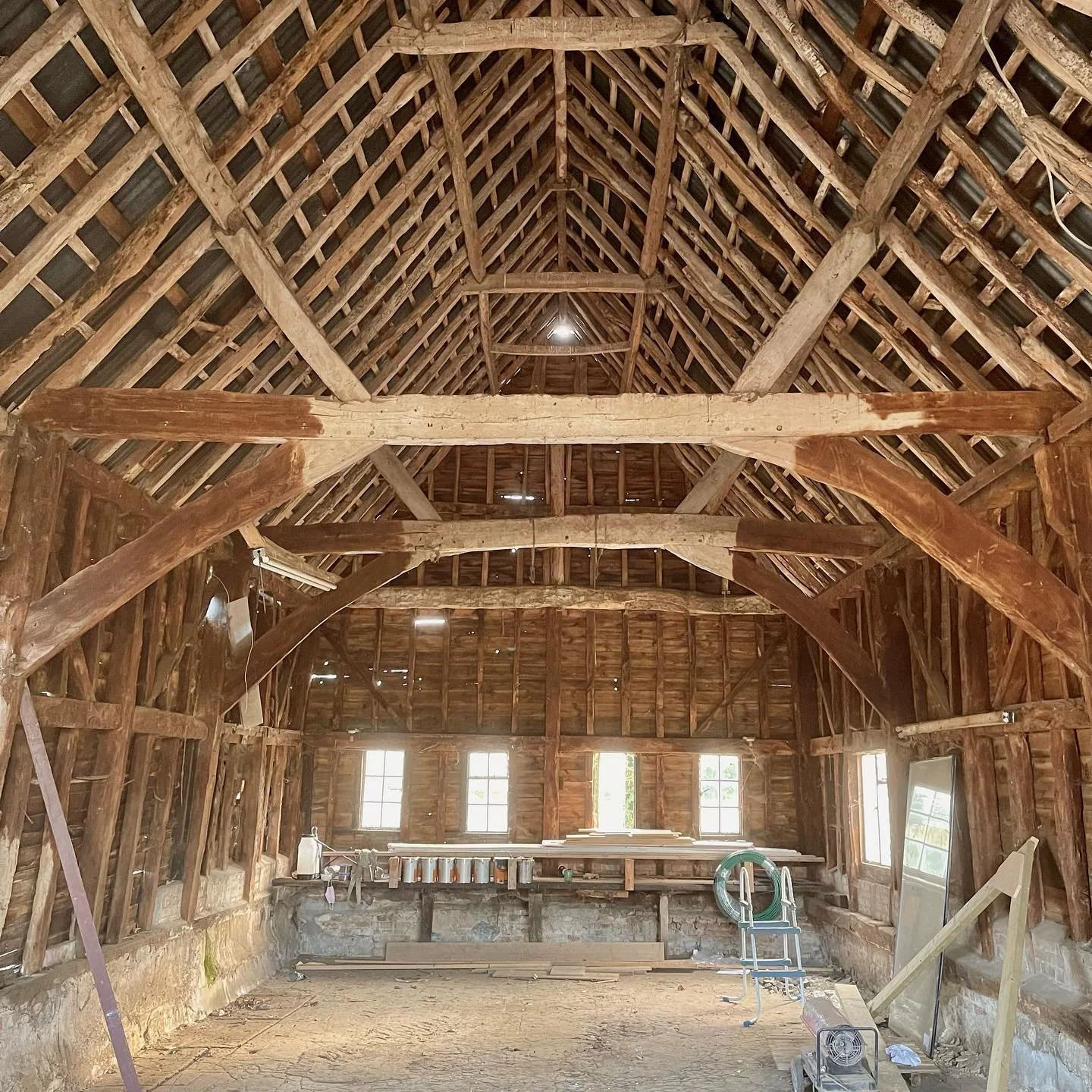 The inside of a beautiful old timber framed barn forming the centrepiece of a new conversion project in Bedfordshire currently in progress in the office. 

#mdparchitects #architecture #conservationarchitects #barn #barnconversion #listedbuilding