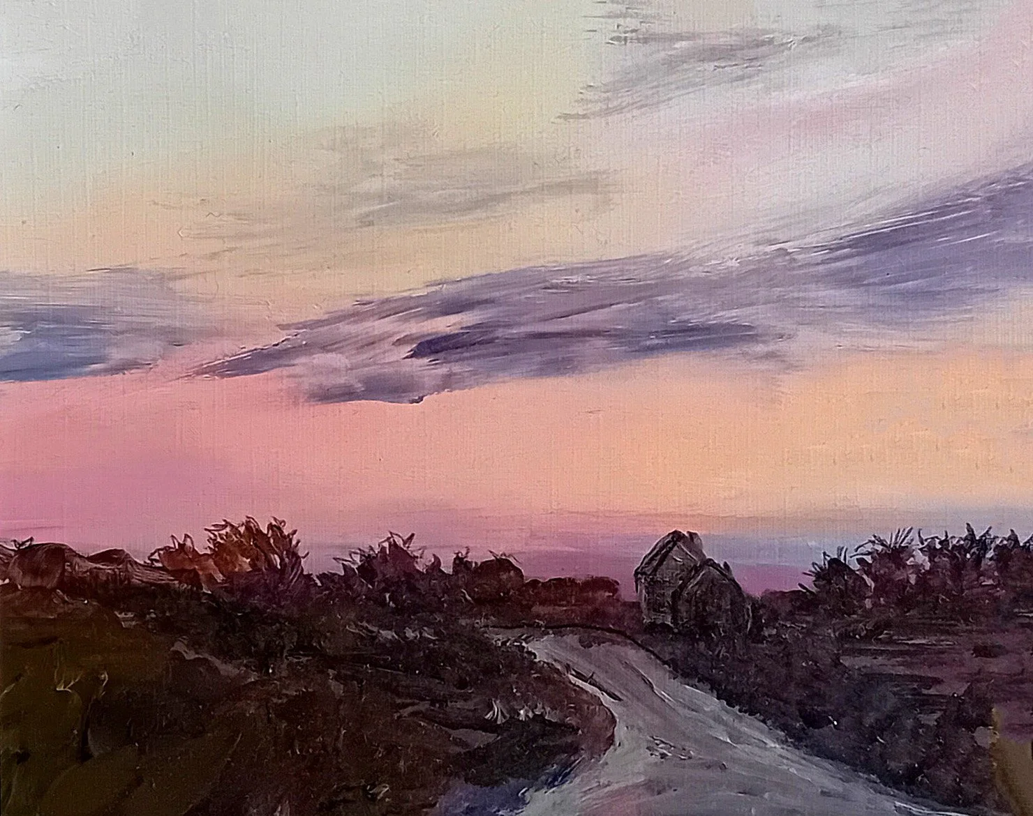 Painting of a rural landscape at sunset with a dirt road, a small house on the right, and trees and bushes in the foreground, with a colorful sky with clouds in the background.
