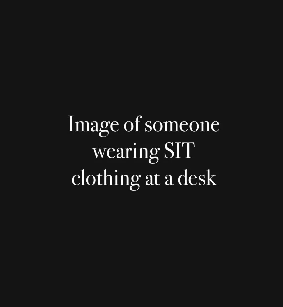 Placeholder image with text stating 'Image of someone wearing SIT clothing at a desk'.