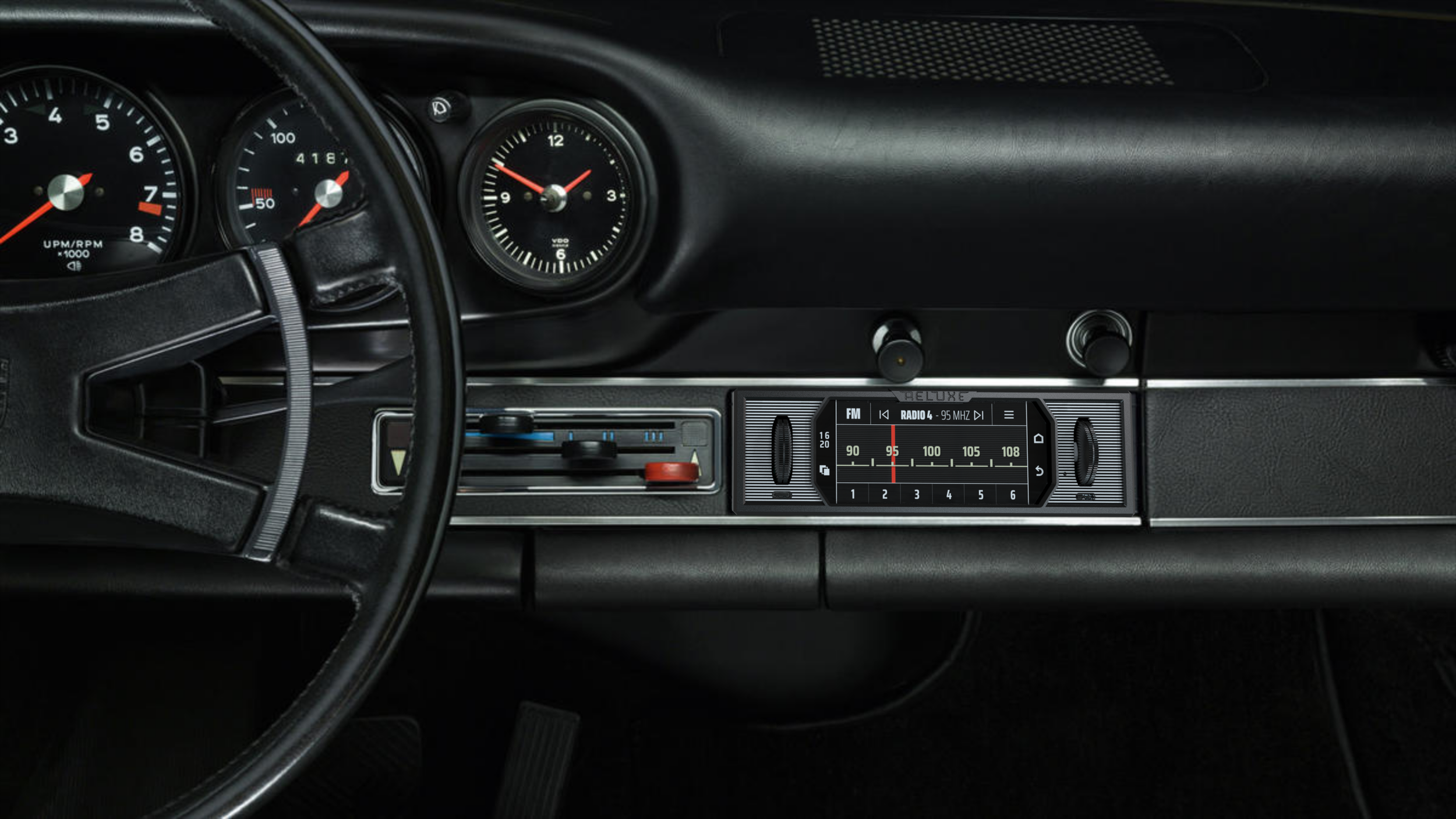 Reluxe Stereo Black edition in Porsche G-series dashboard, featuring matching design, wireless Apple Carplay, Android Auto and DAB radio