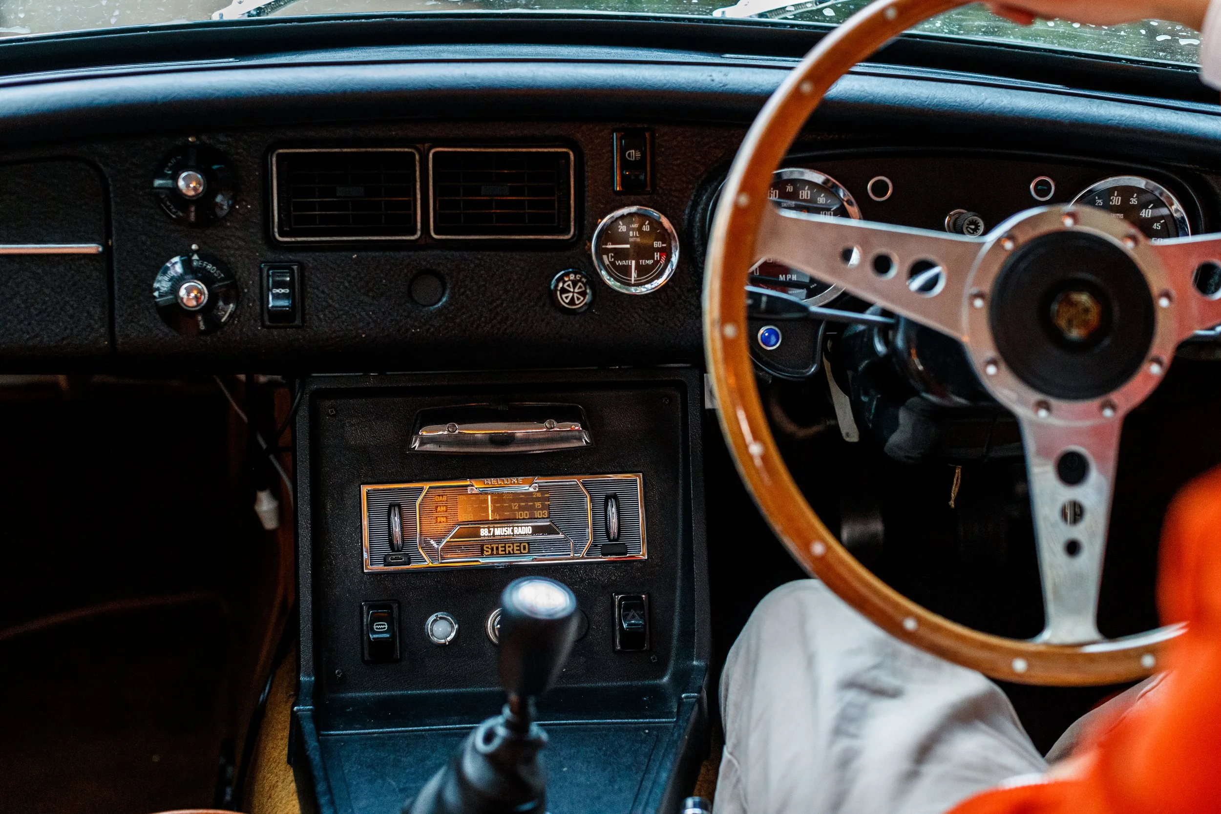 Reluxe Stereo Chrome Edition in MGB GT dashboard, featuring magnetically attached NFC smart cover to complete the retro look, with wireless Apple Carplay, Android Auto and DAB radio