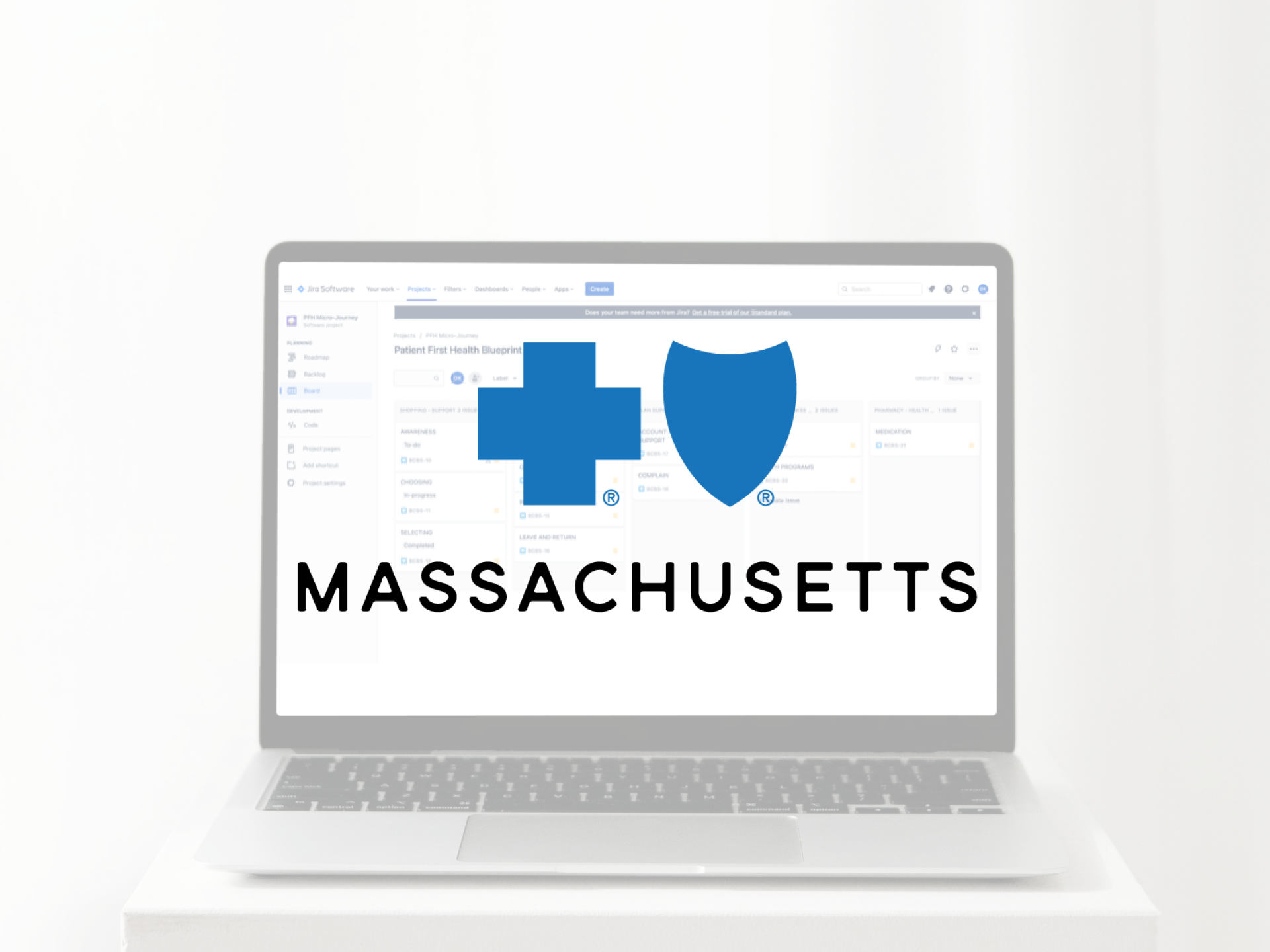 Laptop screen showing a project management software open to a health-related project, with the words 'Massachusetts' below a blue medical cross and shield logo.