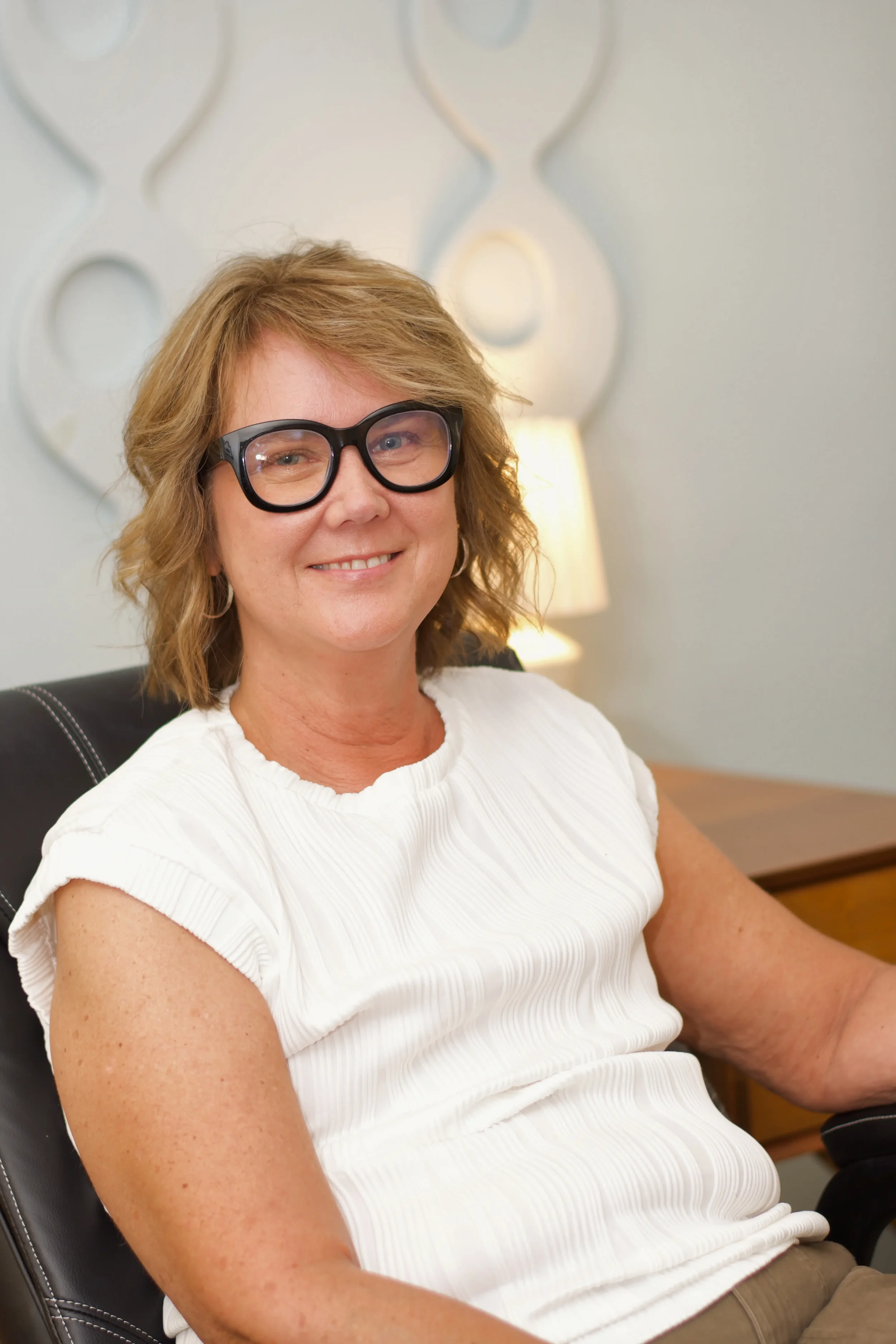 Kathie Nowicki headshot smiling and welcoming