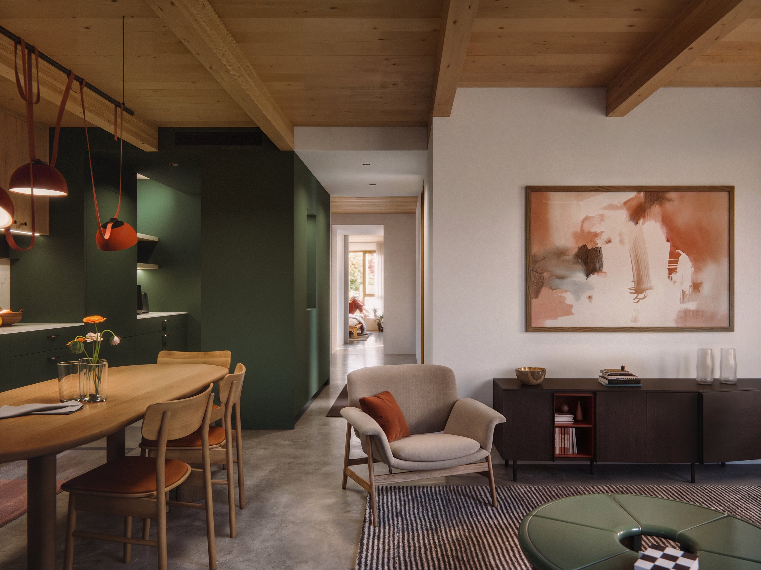 Living room with beige armchair and dark wooden sideboard on white wall, abstract artwork, and green round table.