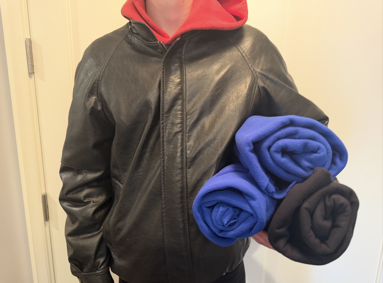 Finished blankets sewn from reclaimed fabric, rolled and ready to be delivered to New Yorkers in need