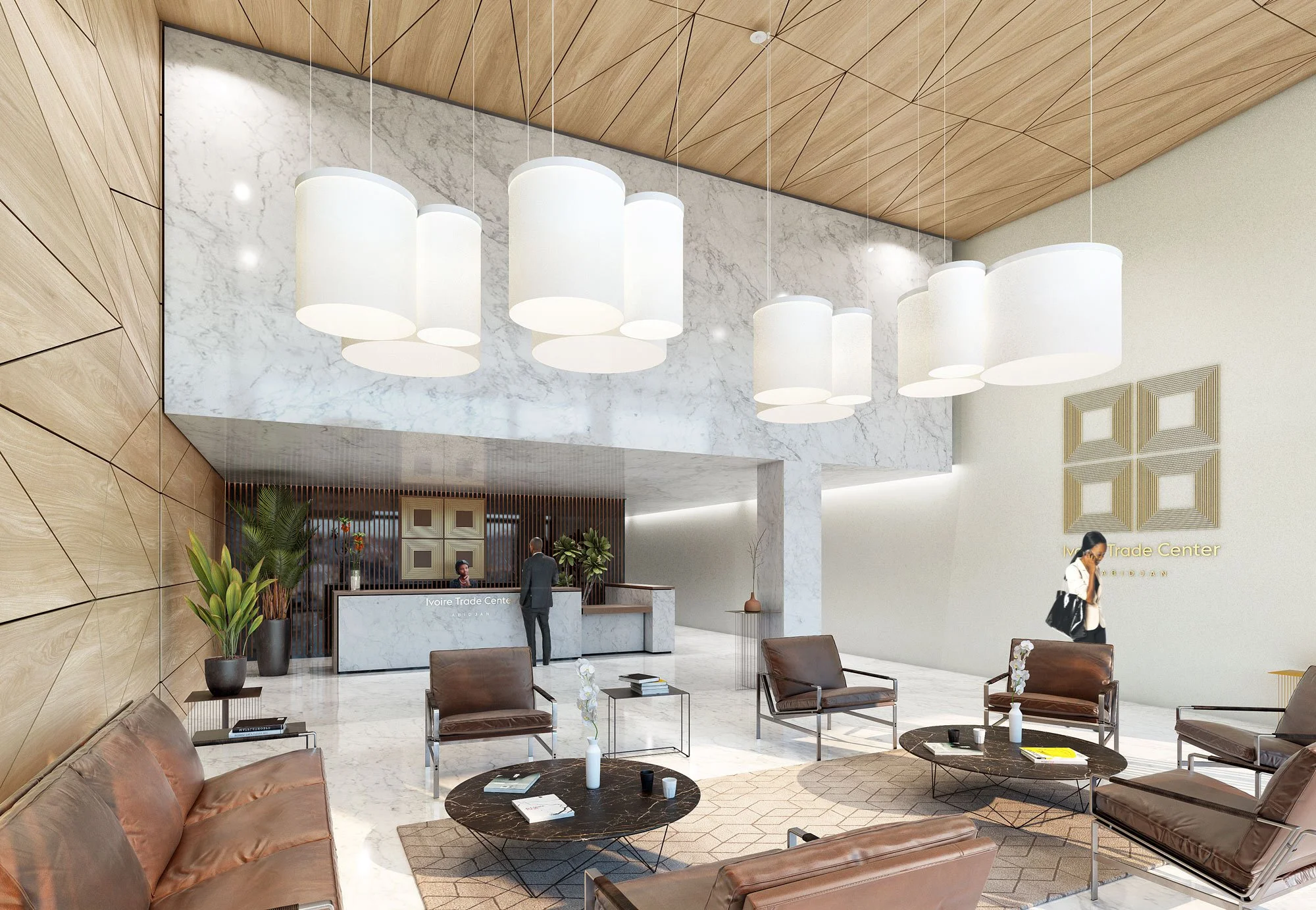 Lobby du centre commercial Ivoire Trade Center à Abidjan avec un mobilier moderne, un comptoir d'accueil en marbre, des plantes vertes, un sol en marbre blanc et un mur en bois, avec des luminaires suspendus blancs.