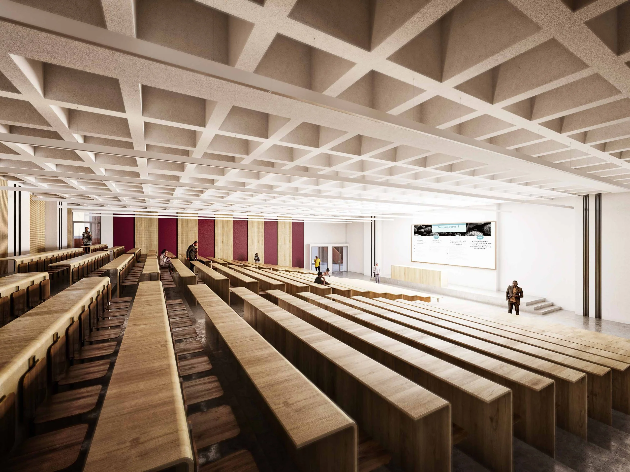Une salle de conférence ou auditorium moderne avec rangées de bureaux en bois et chaises, un écran numérique au fond, et quelques personnes assises ou se déplaçant dans la pièce.