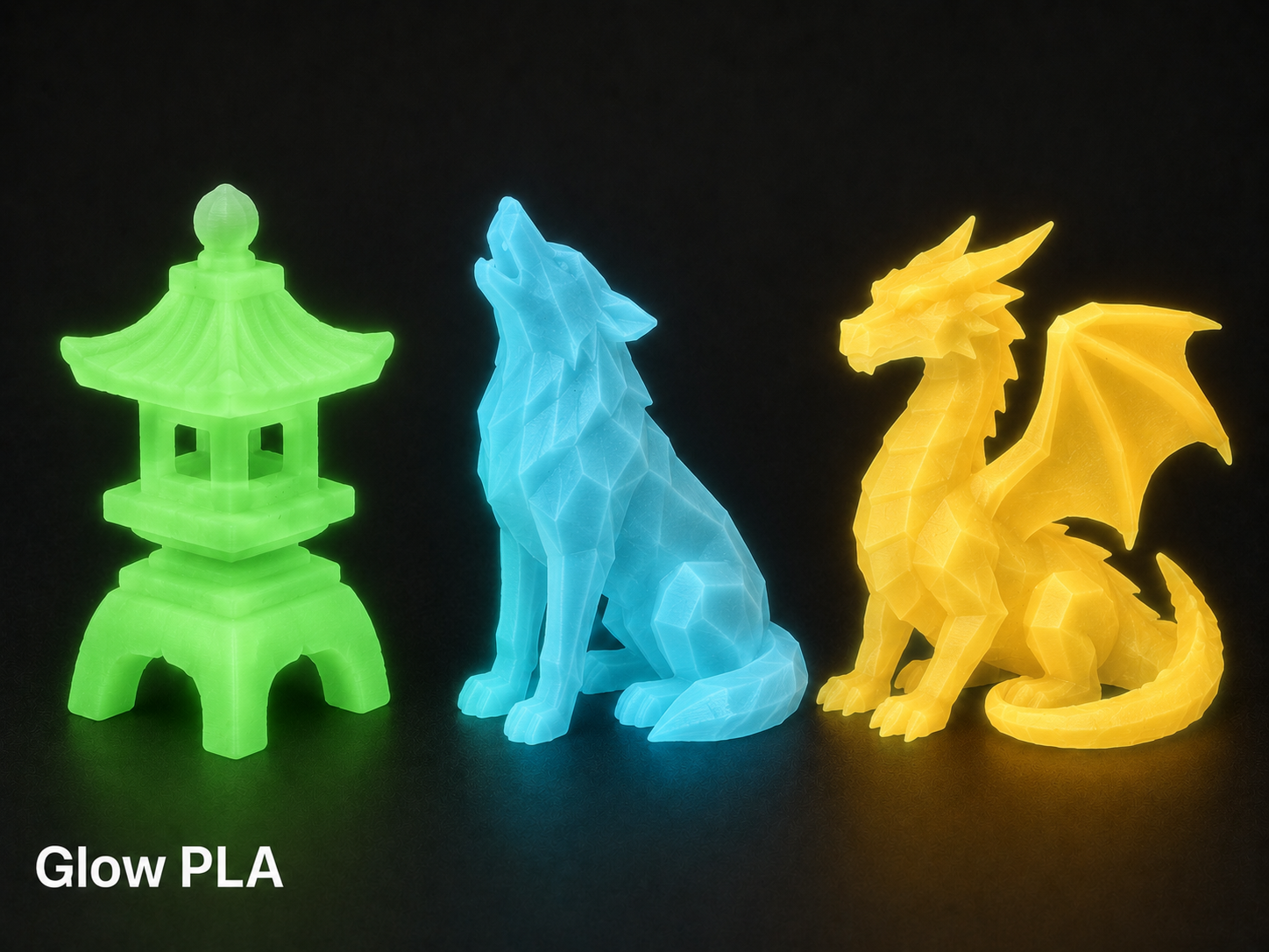 Glow-in-the-dark PLA filament sculptures of a green pagoda, a blue wolf, and a yellow dragon against a black background.