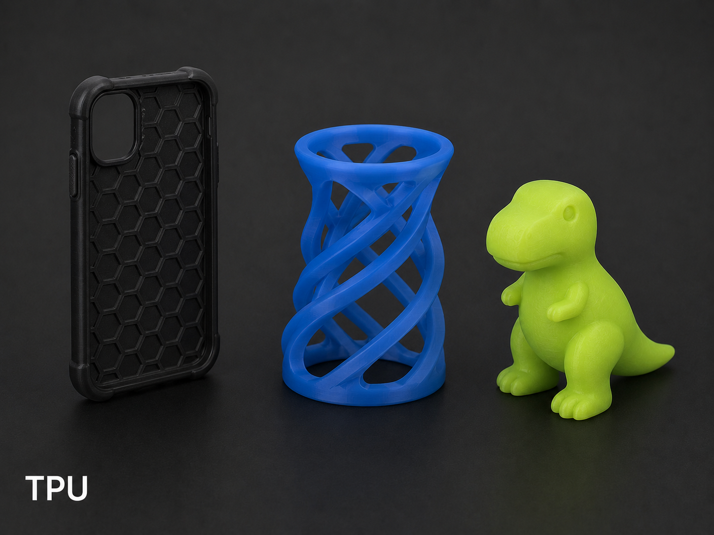 Black phone case with honeycomb pattern, blue 3D-printed vase with interwoven design, lime green dinosaur toy figurine, and the letters 'TPU' in the bottom left corner.