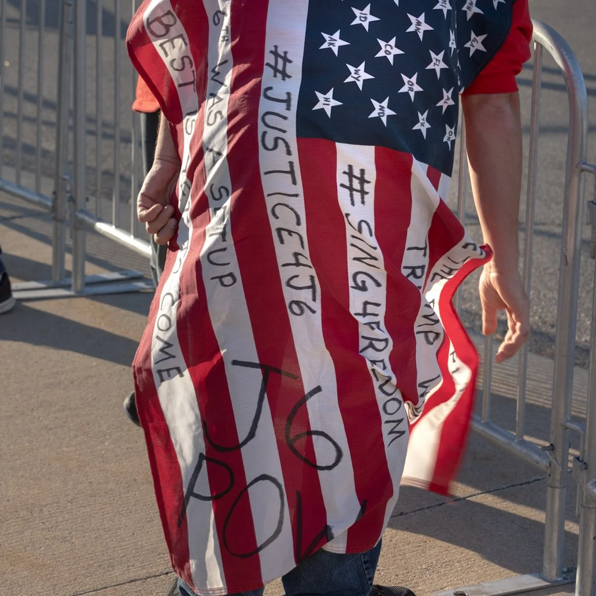 A January 6 sympathizer photographed at a Trump rally in Detroit, Michigan. Photos © George Jesse