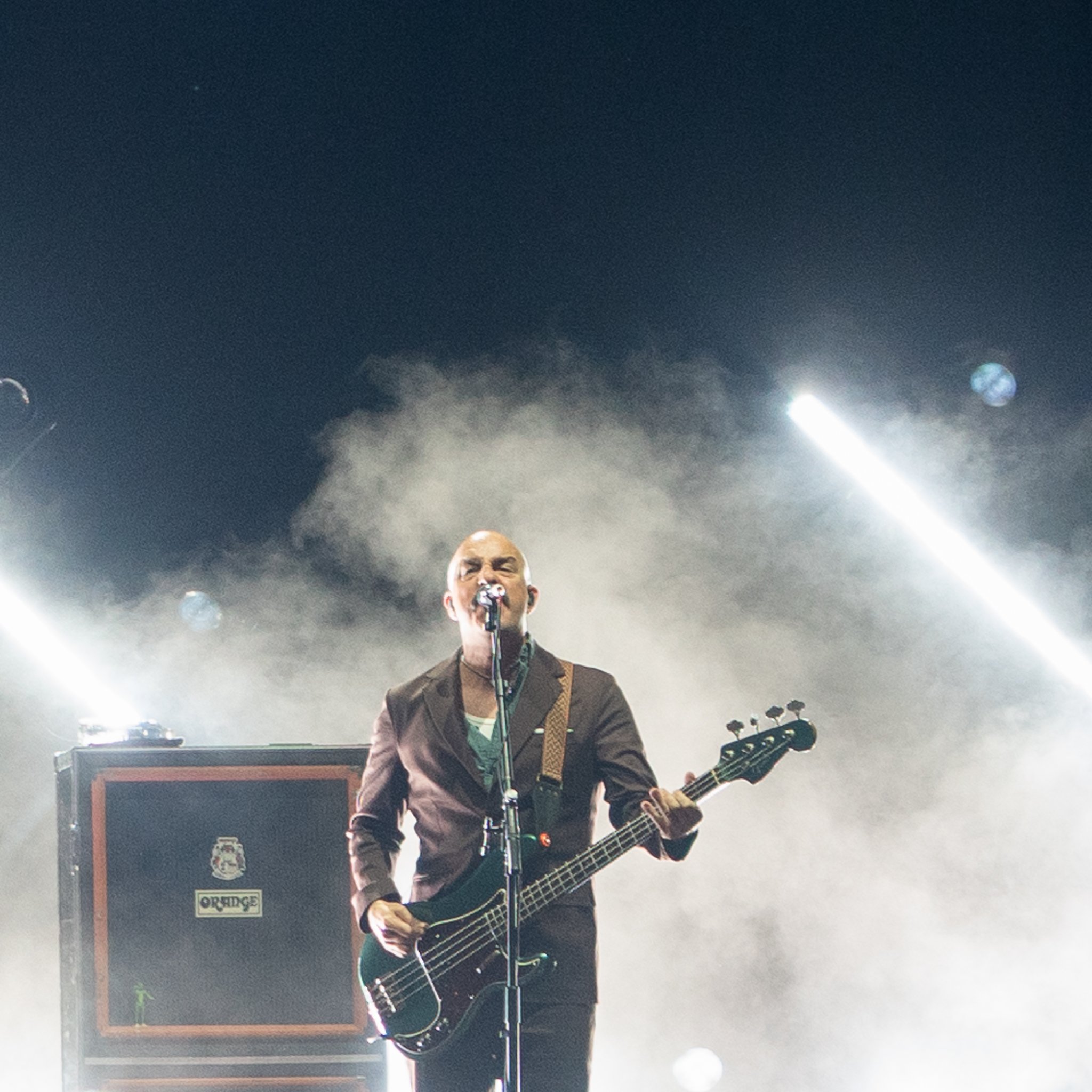 Dan Andriano playing bass live at Ruoff Music Center during Alkaline Trio’s Missionary Impossible Tour appearance.