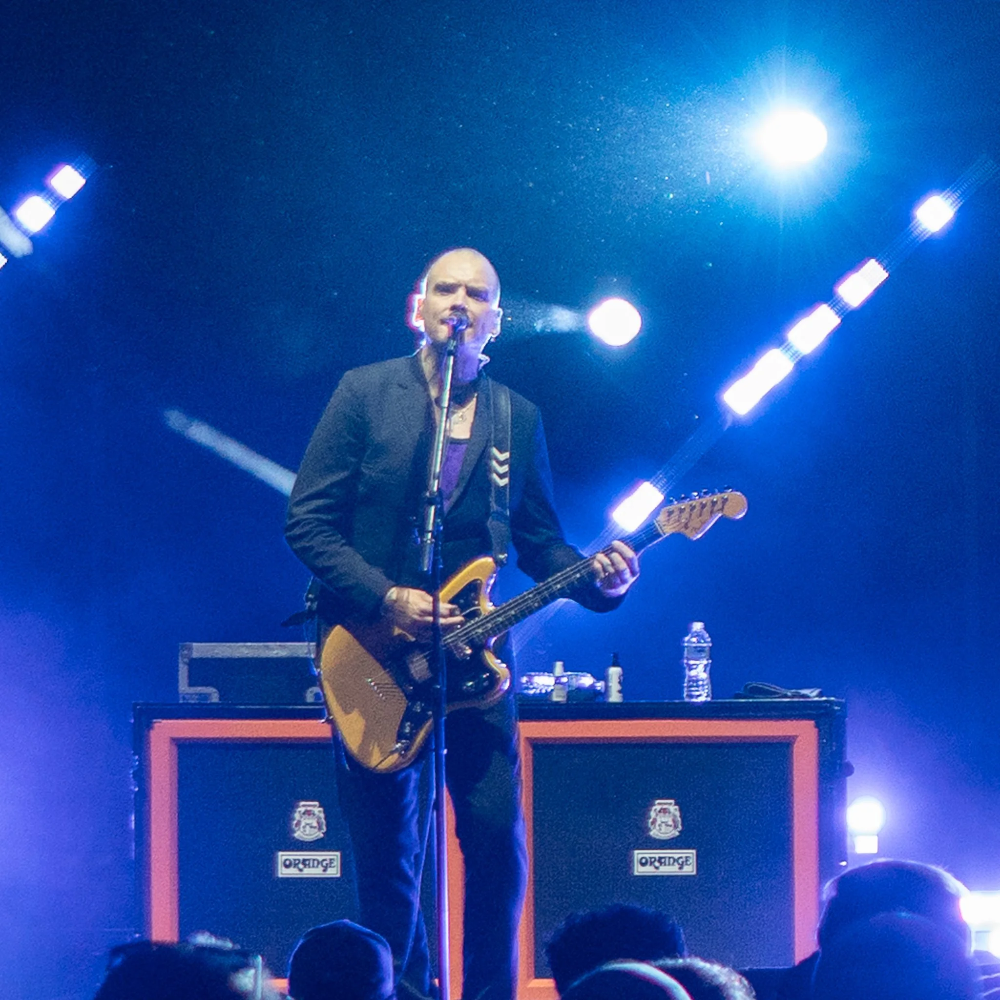 Matt Skiba singing and playing guitar onstage during Alkaline Trio’s Missionary Impossible Tour performance in Noblesville, Indiana.