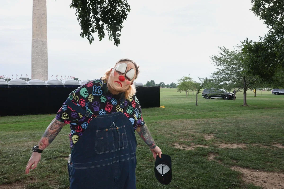 UFC fan wearing a homemade Slipknot mask near the Washington Monument at UFC Freedom 250 Washington DC June 14 2026