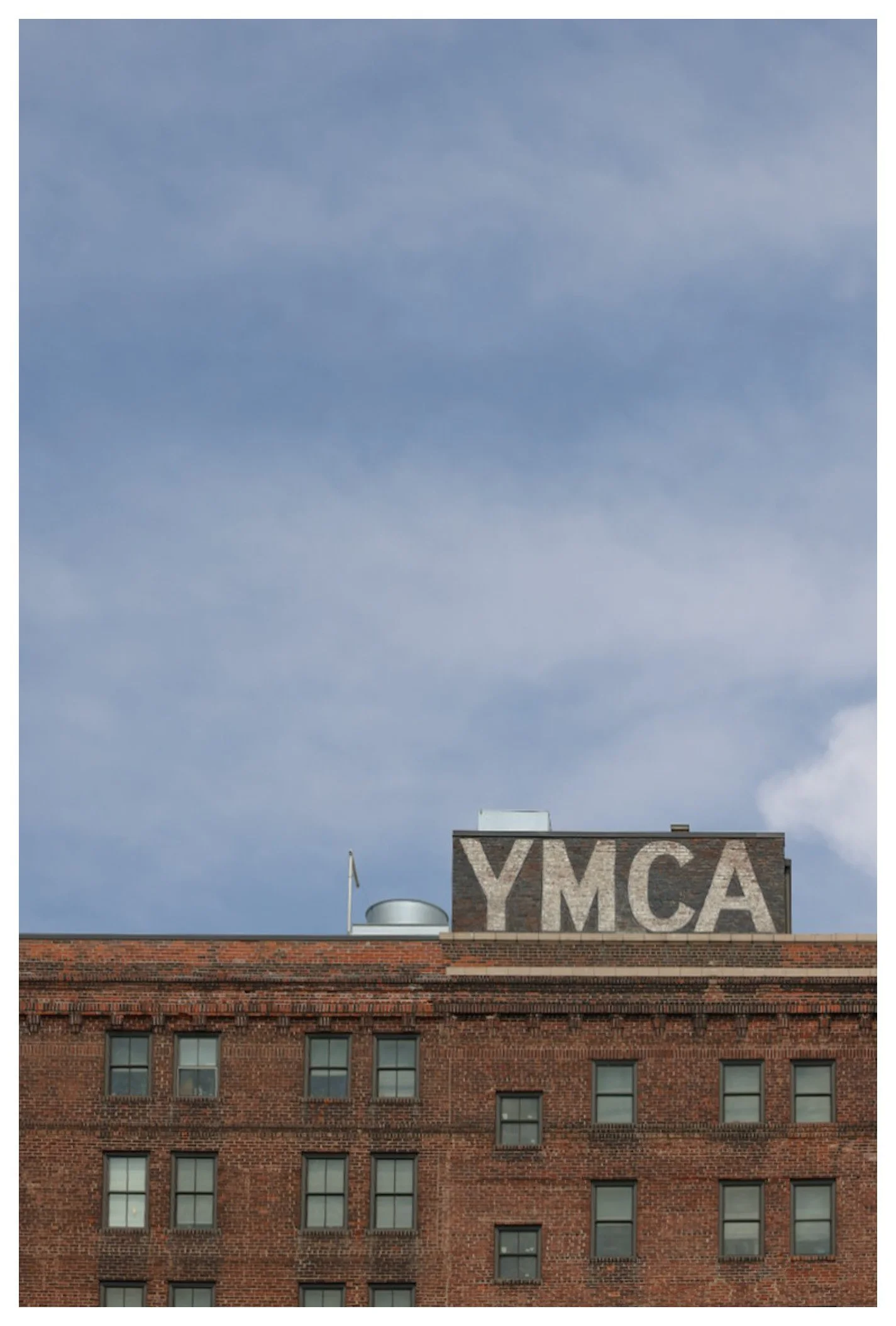 Vintage YMCA sign photographed on Central Avenue in Cincinnati, Ohio during July 2026.