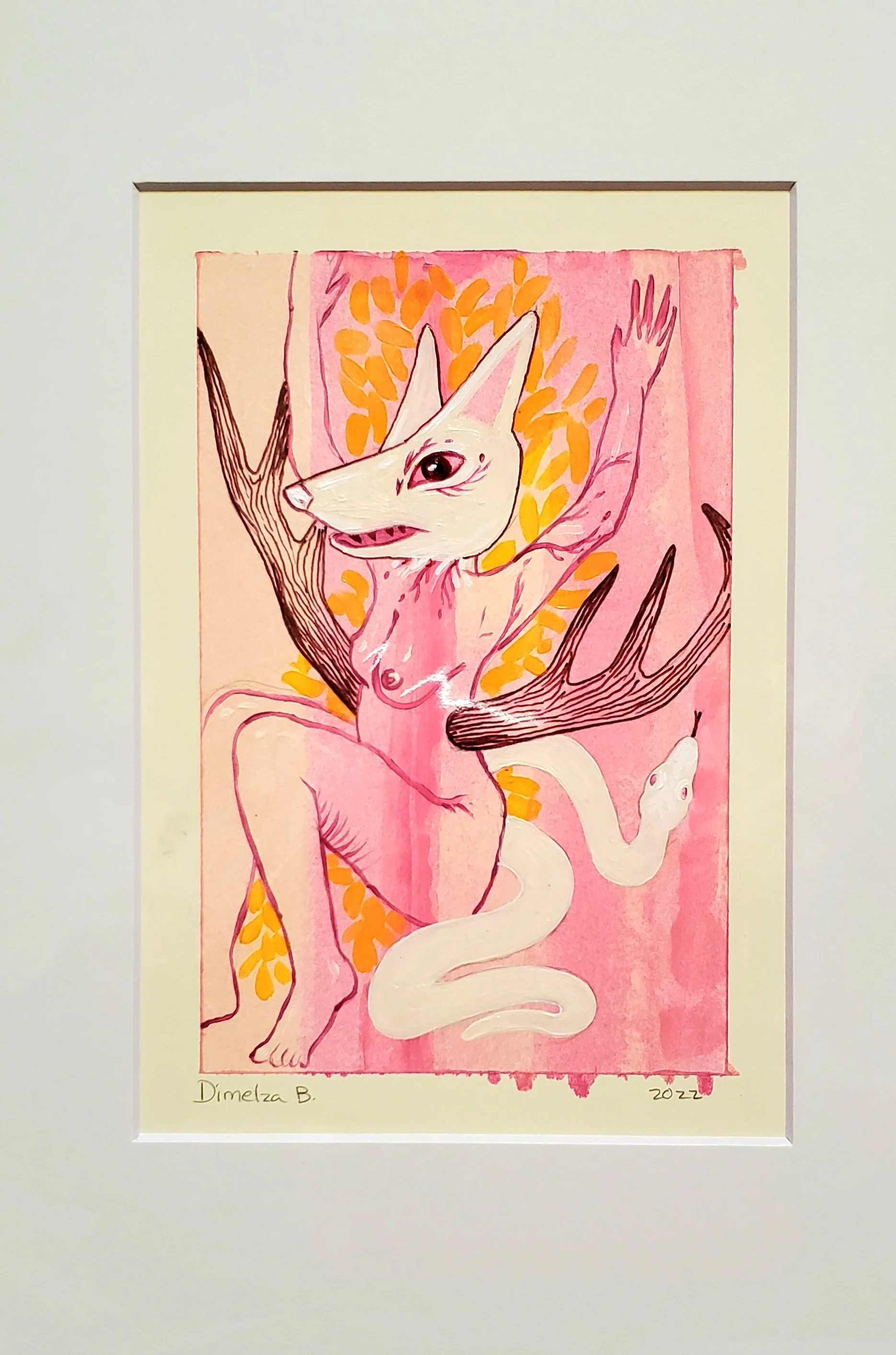 A watercolor painting of a mythical creature with the head of a fox and the body of a woman, with antlers coming out of the ribcage, and arms raised, surrounded by orange leaves on a pink background. Signed by Dimelza B. and dated 2022.