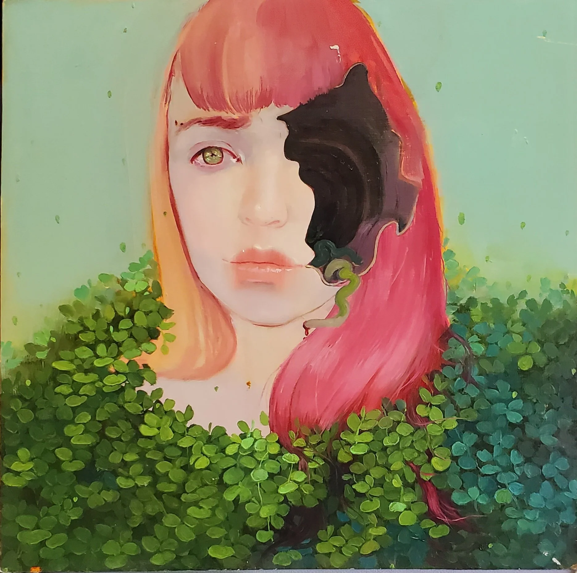 Painting of a woman's face with red hair, green eyes, and pink lips, surrounded by green leaves and a black flower covering one eye.