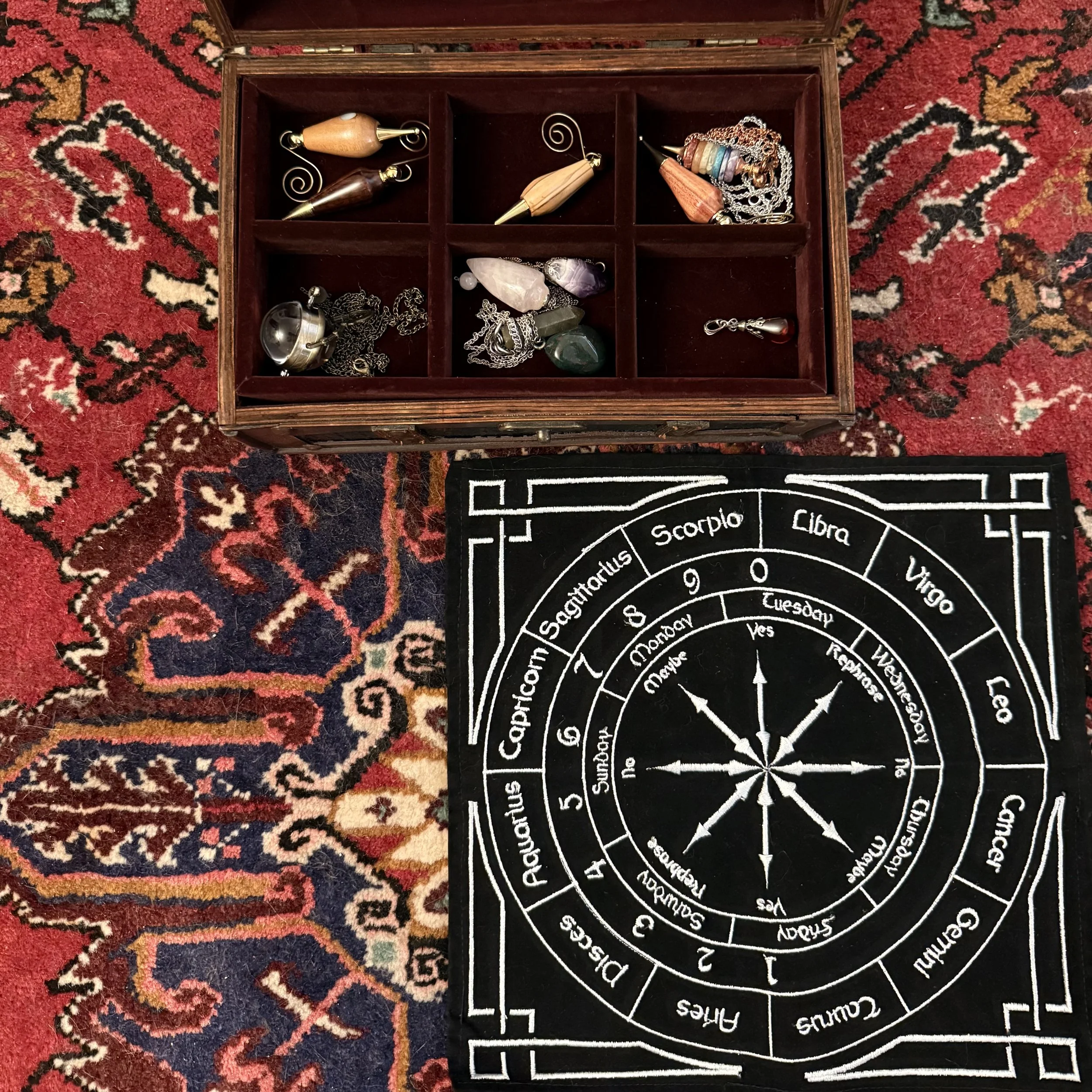 Pendulum divination tools.