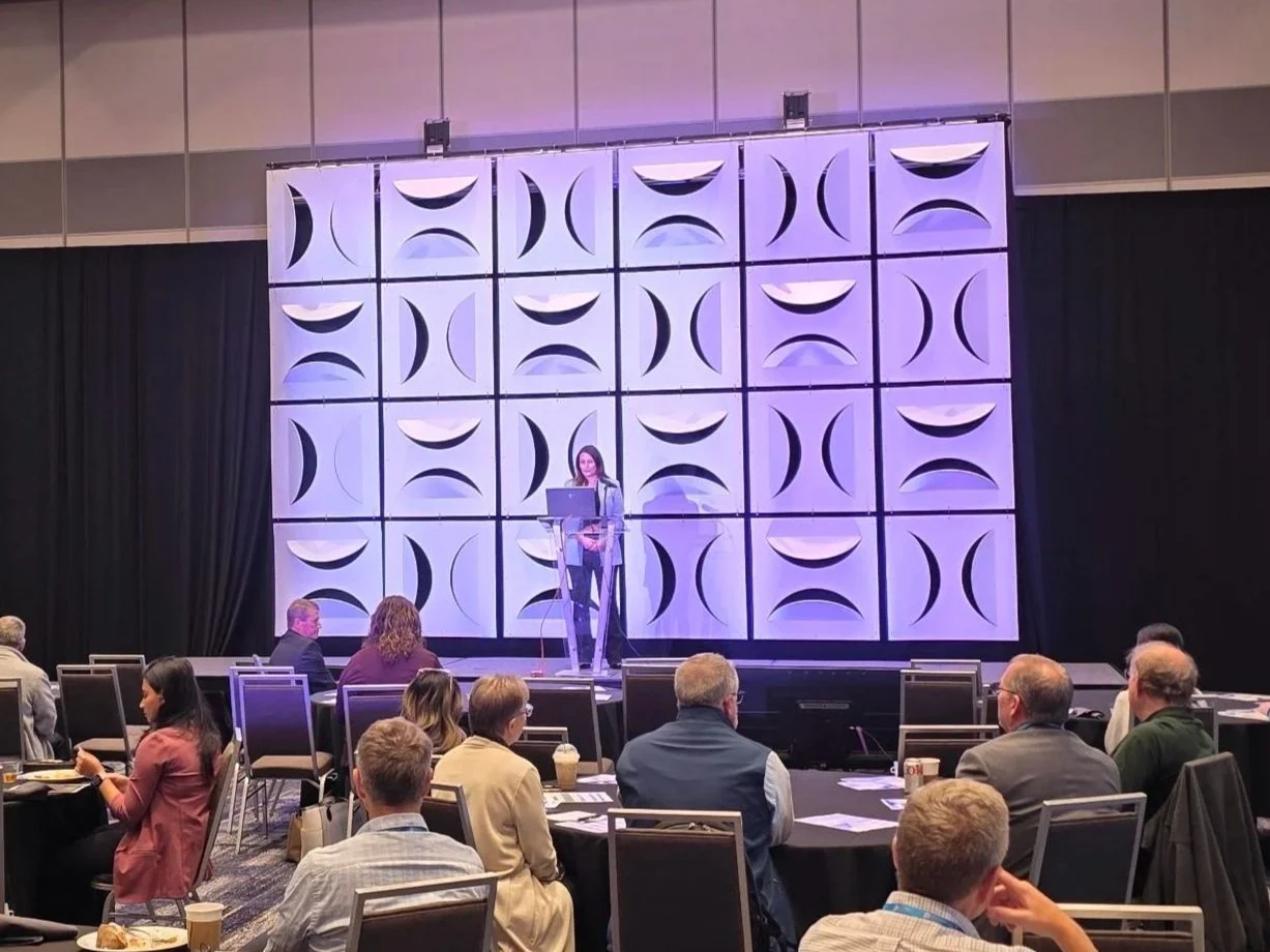 Shelley Seewald delivering the closing remarks at the Wisconsin IT Symposium 2025.