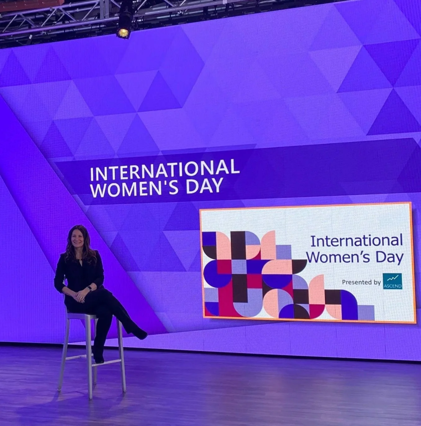 Shelley Seewald presenting at an International Women's Day event.