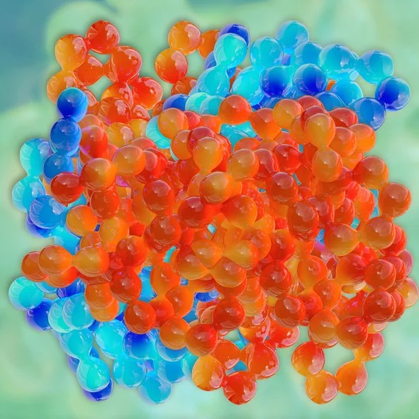 Close-up of colorful plastic toy balls in orange, blue, and red.