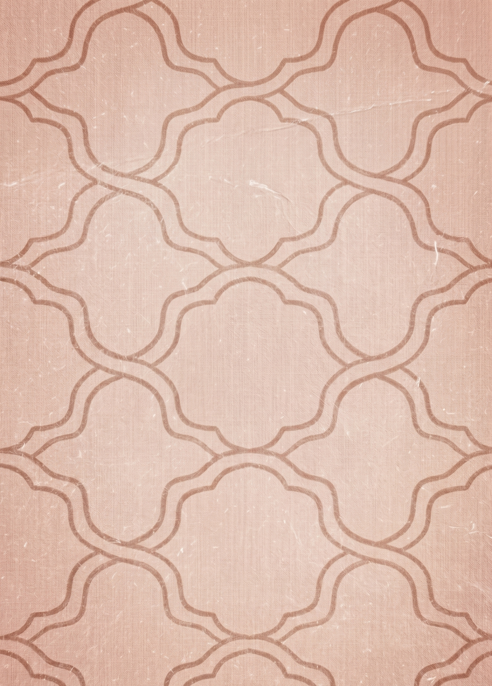 A pink or peach-colored surface with a repeating geometric pattern of interconnected curved lines, resembling a tile or wallpaper design.