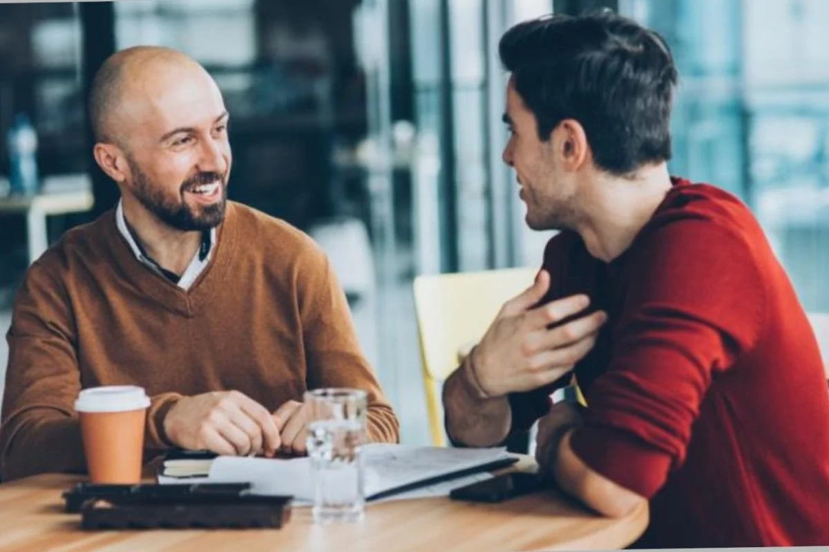 One man listening to another in a thinking partnership