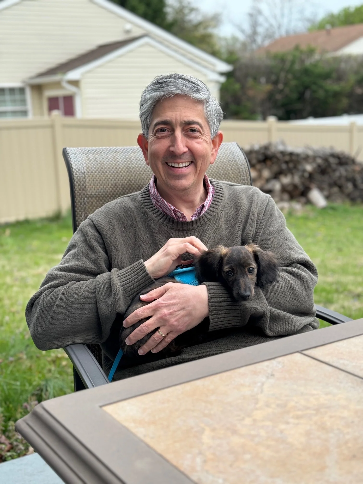 Photo of candidate Alec Stone with his pet dog